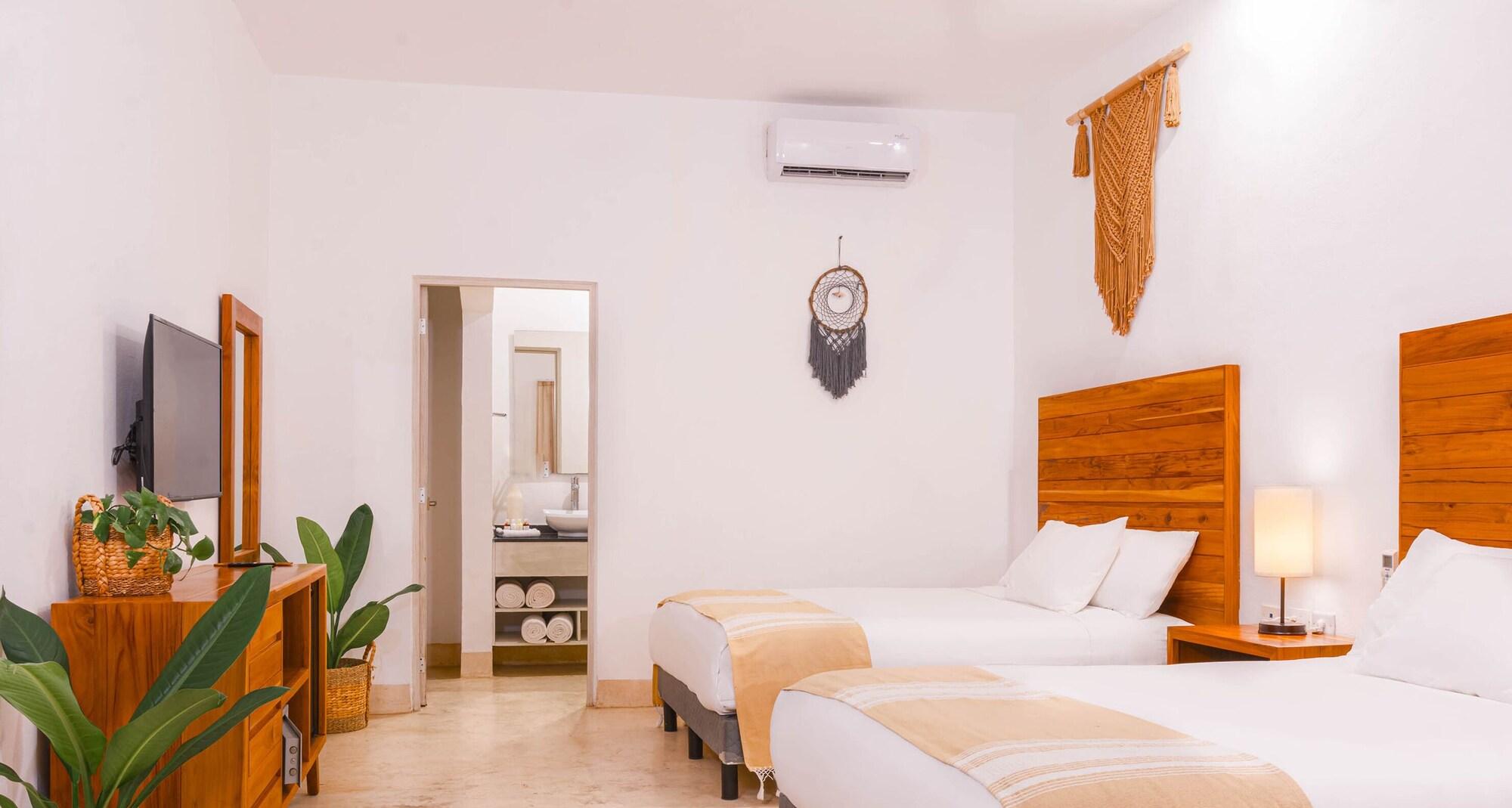 Habitación doble Deluxe, 2 camas Queen size, vista a la piscina