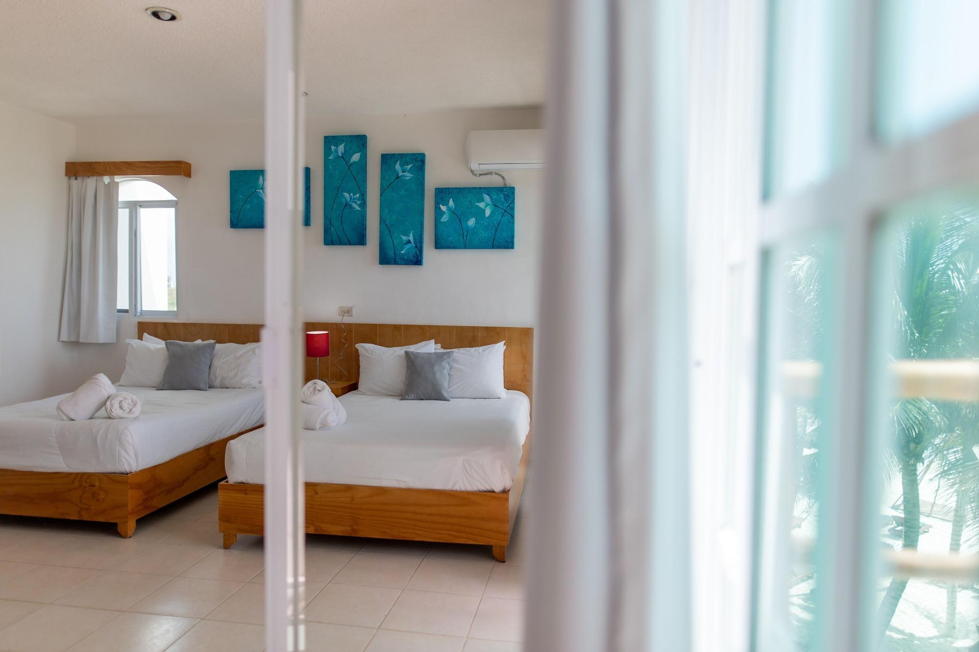 Habitación Deluxe, 2 camas dobles, vista parcial al océano