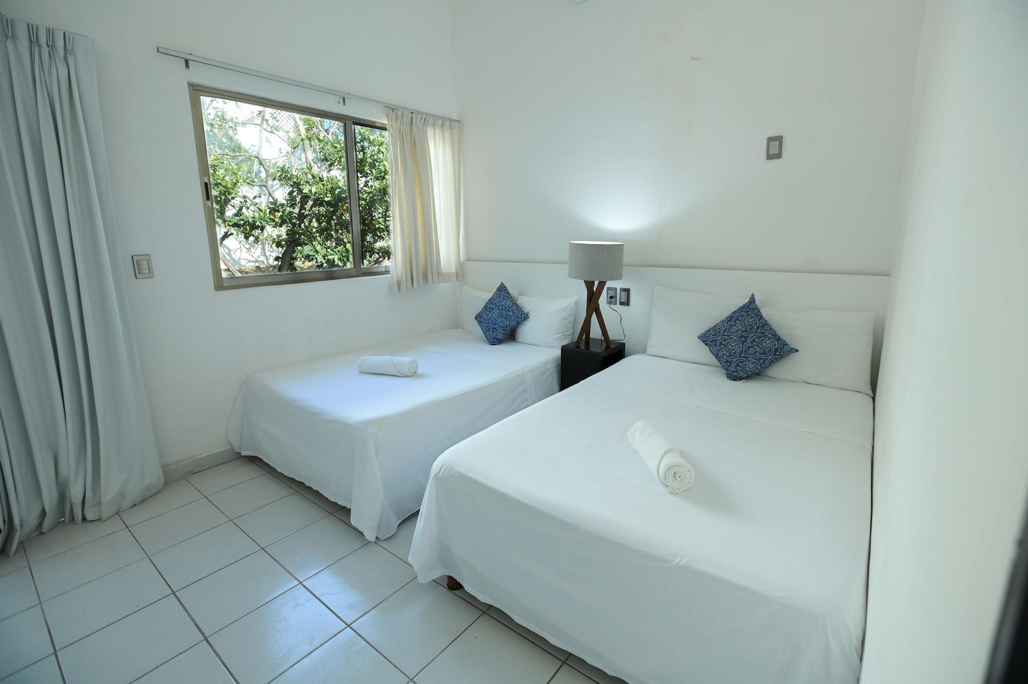 Habitacion Comfort, Patio 2 camas dobles