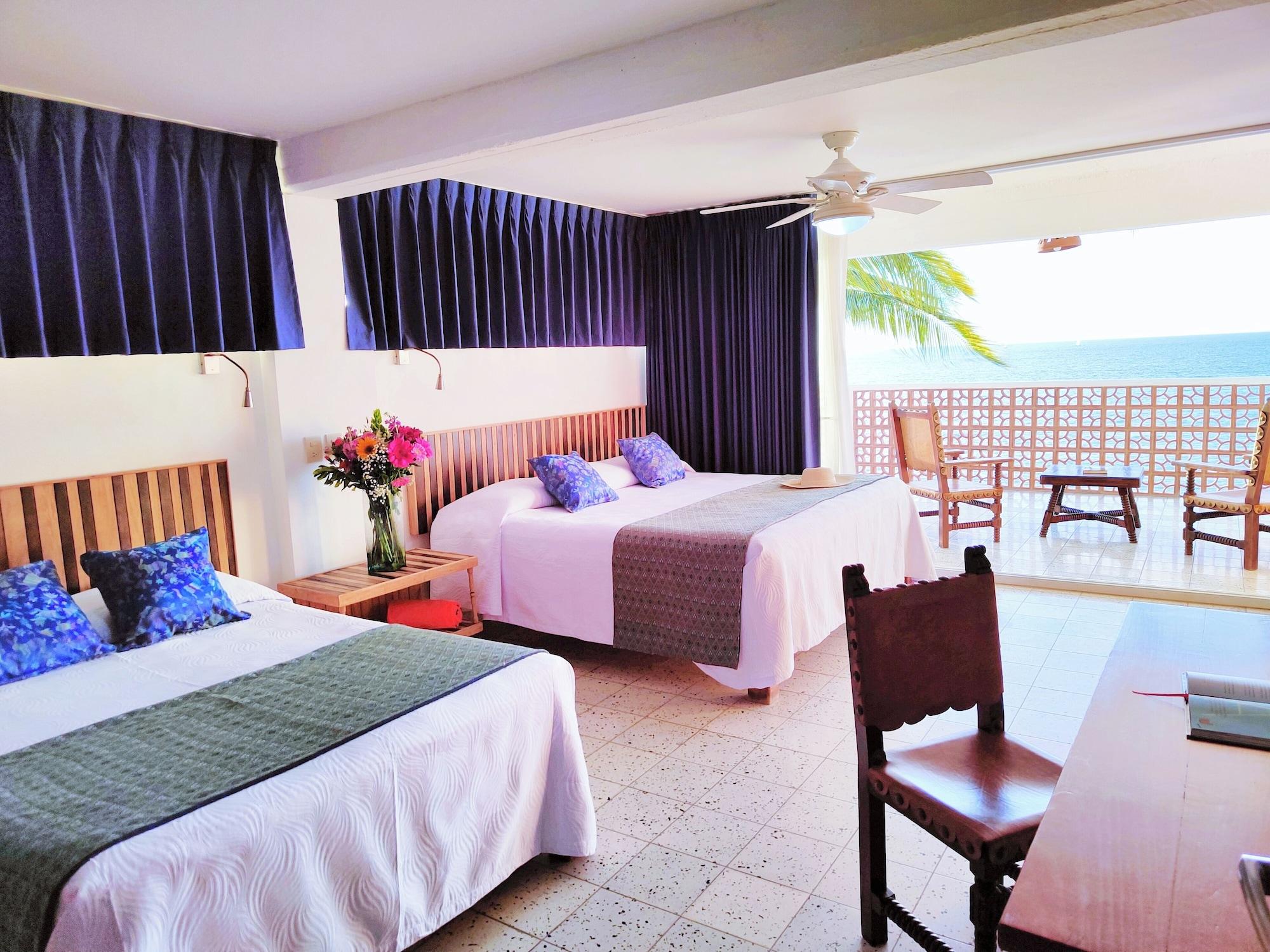 Habitación superior, vista al océano
