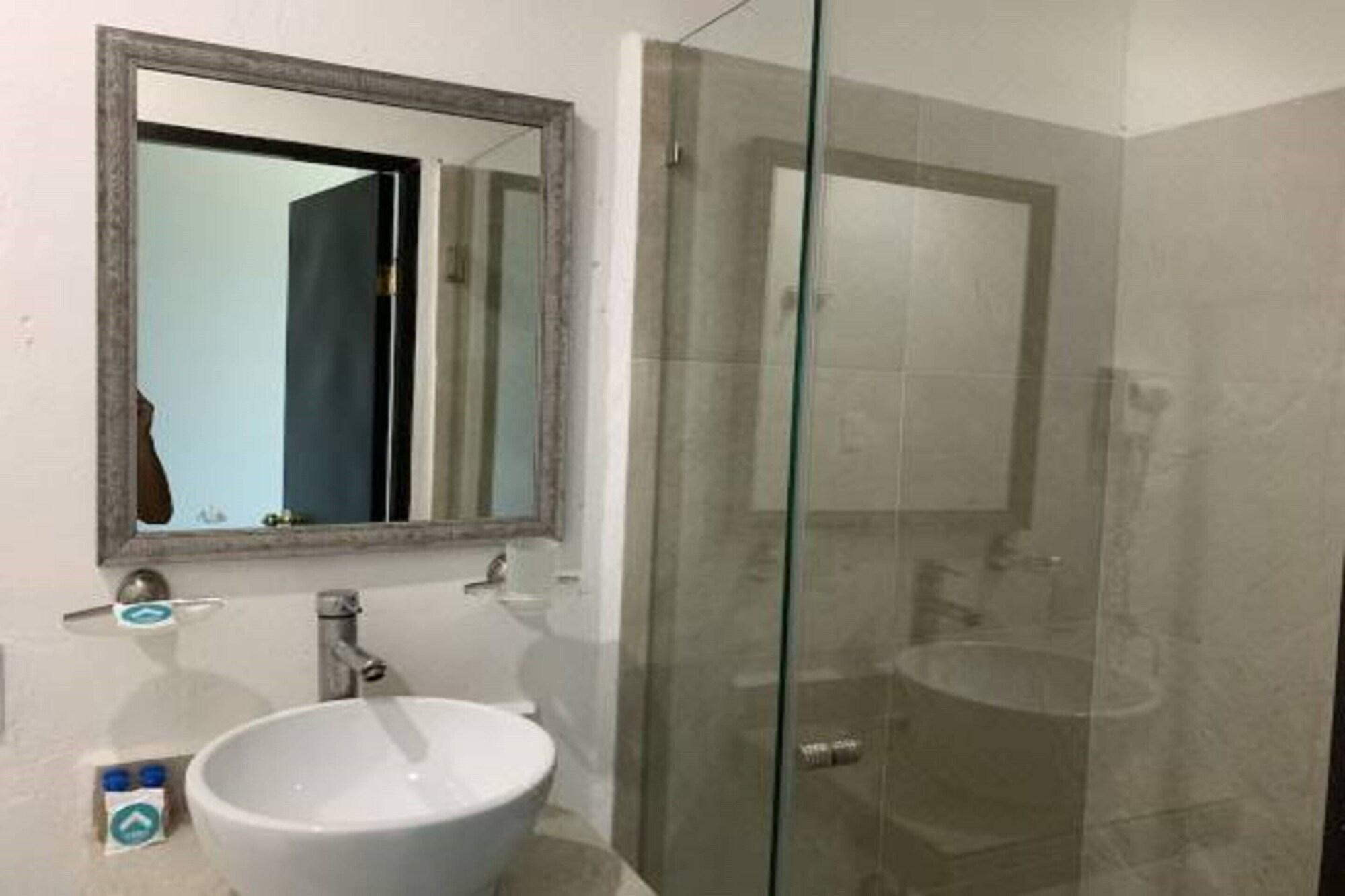 Habitación Deluxe, 1 cama Queen size, vista parcial al océano