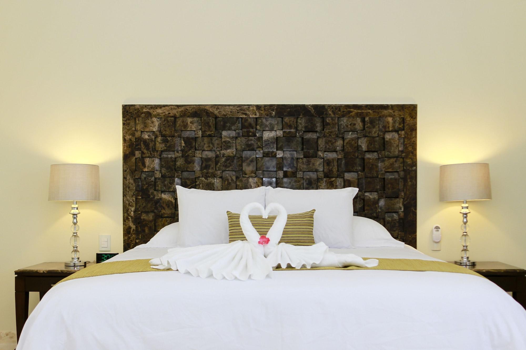 Suite junior, 1 cama King size con sofá cama, en el área del jardín