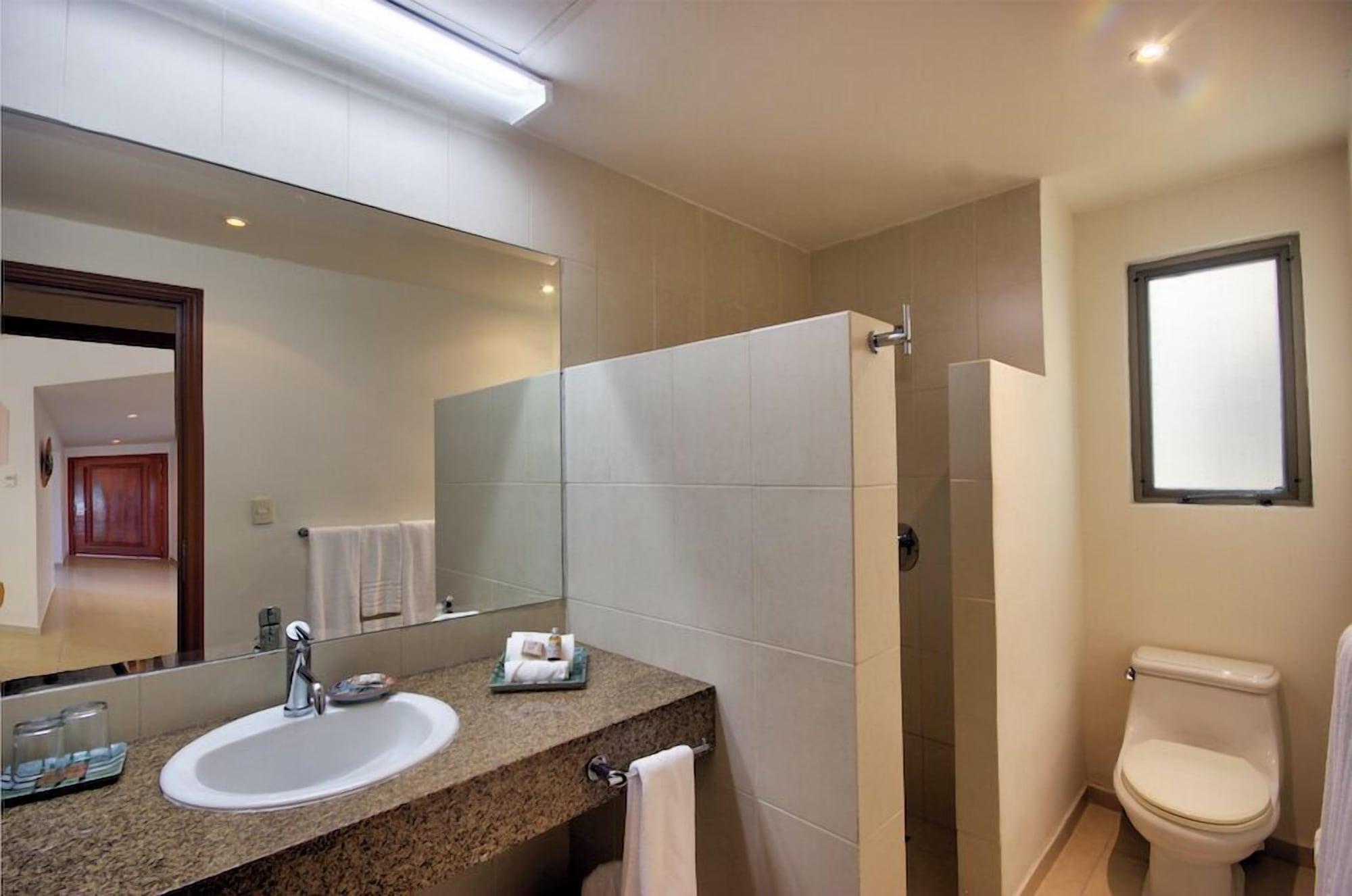 Palmar 2 recamaras Penthouse vista al jardín