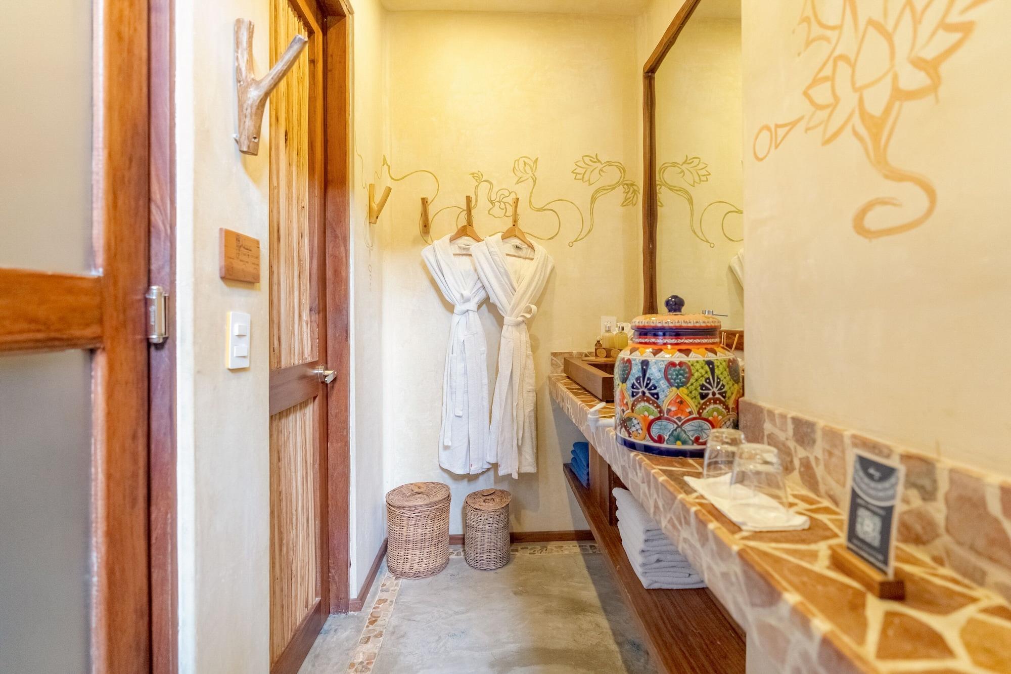 Habitación, 2 camas dobles, vista parcial al océano