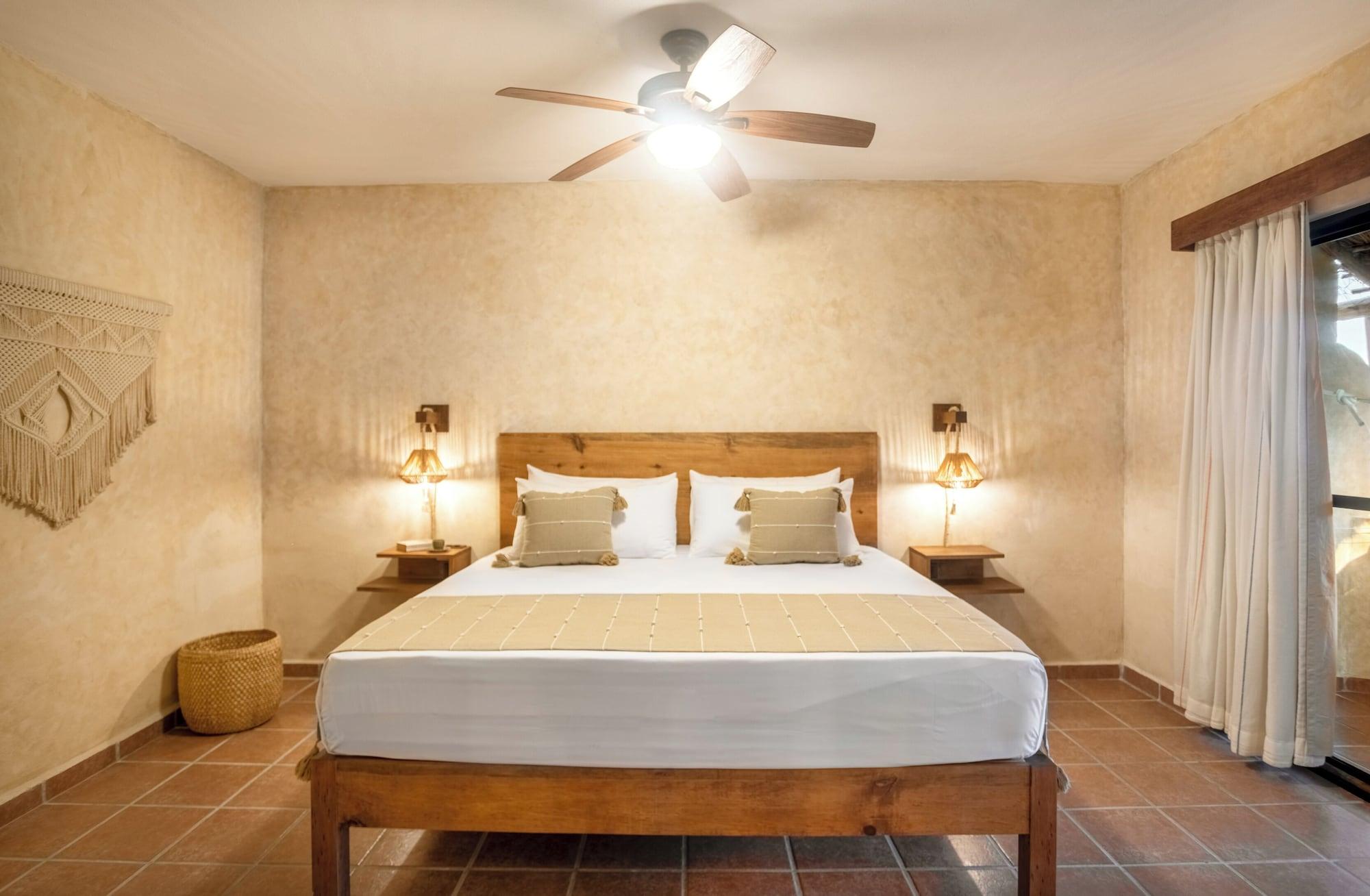 Habitación superior, 1 cama King size, vista parcial al océano