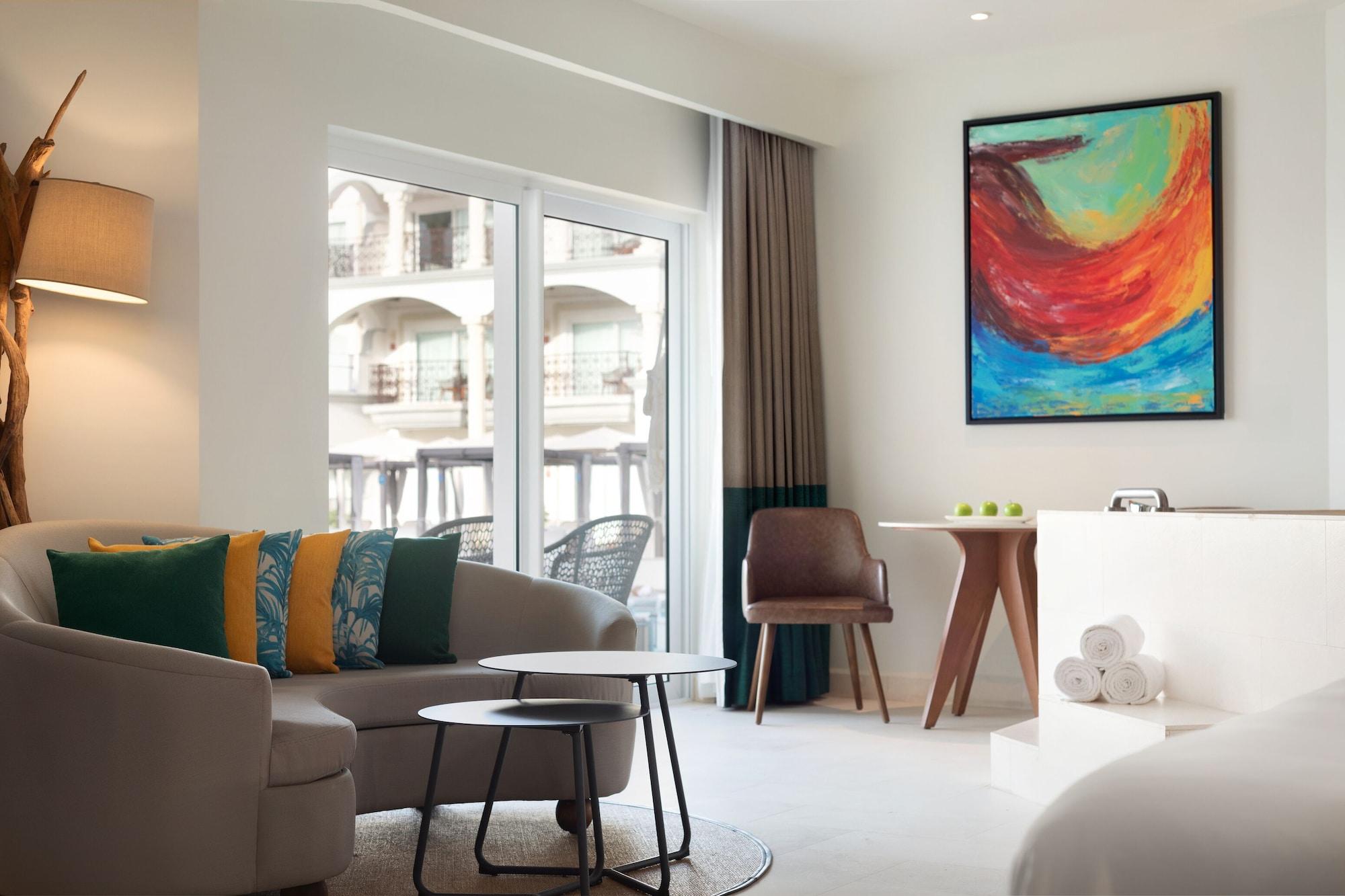 Suite junior, 1 cama King size, vista a la piscina