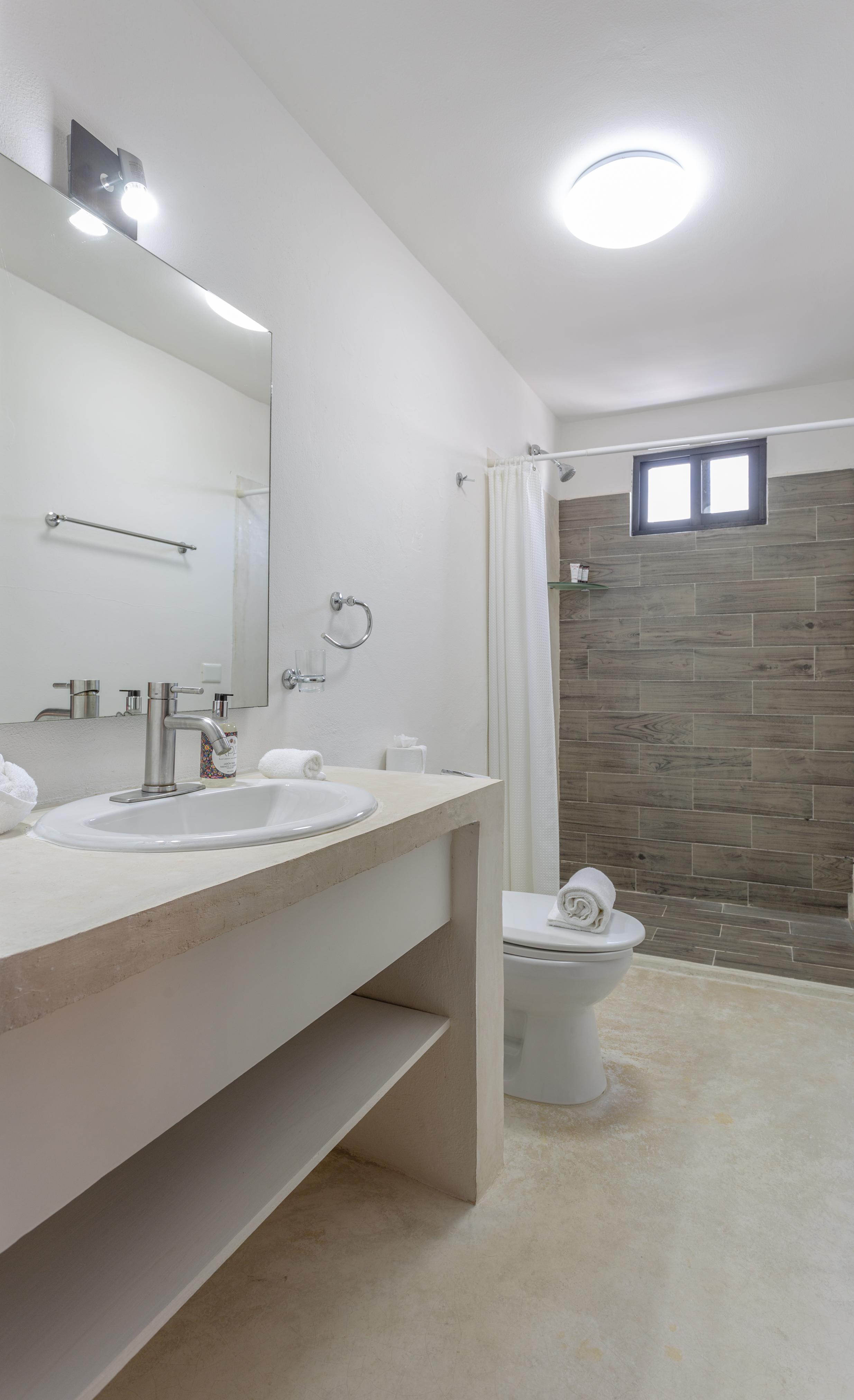 Habitación Triple Superior con Vista al Jardín