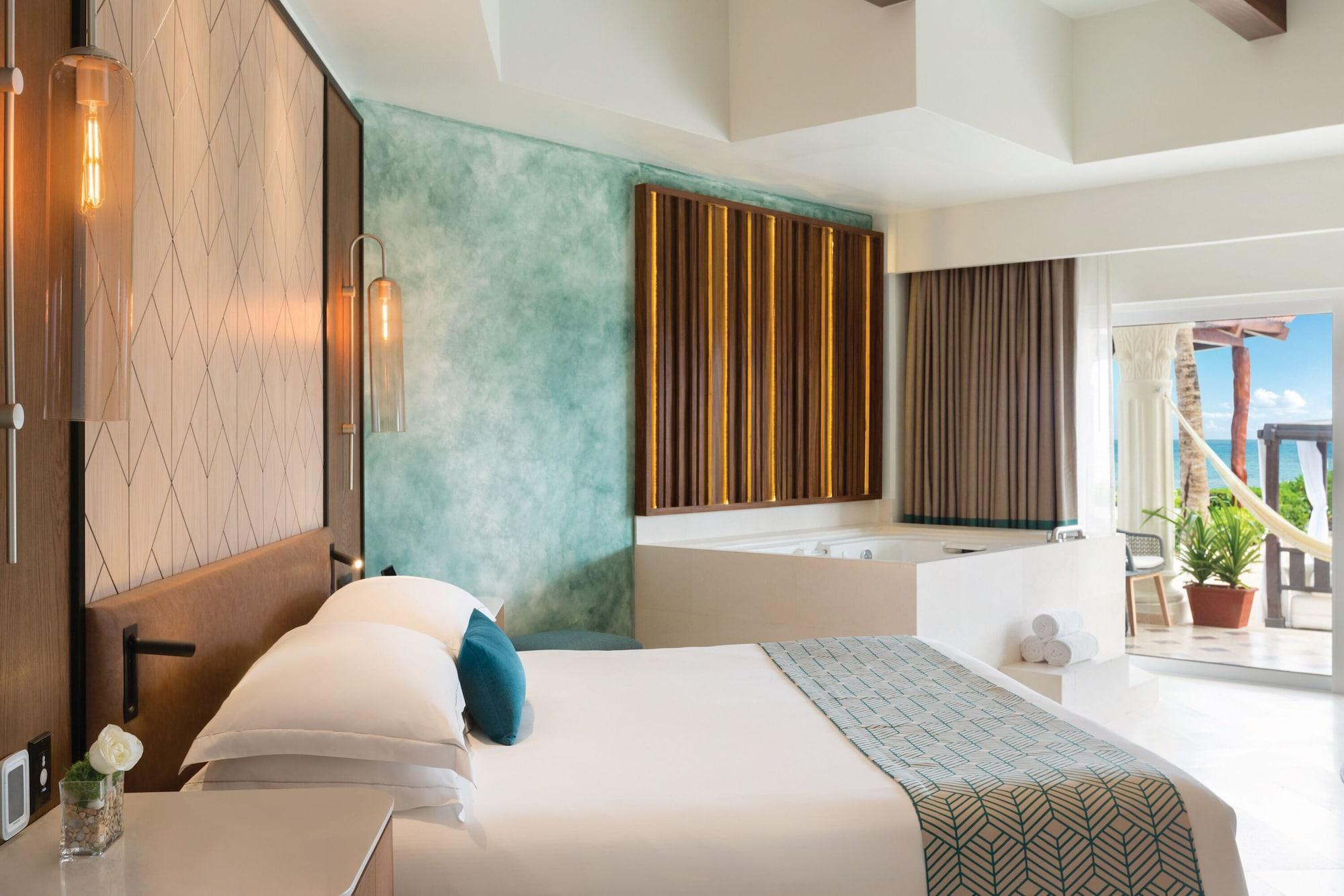 Suite junior, 1 cama King size, frente al océano (Walk-Out)