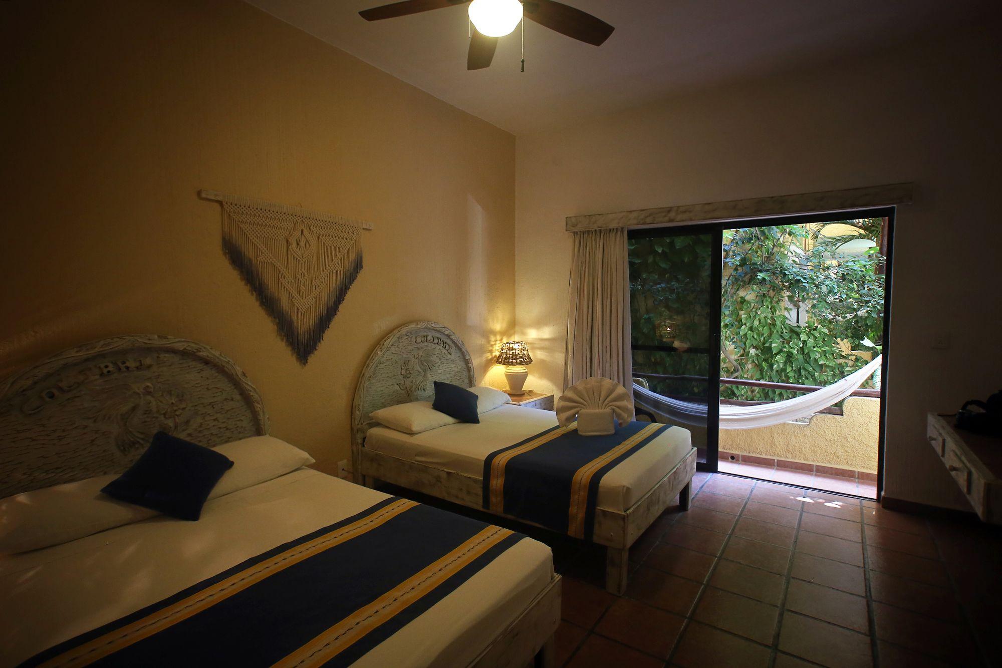 Habitación estándar, 2 camas dobles, vista al jardín