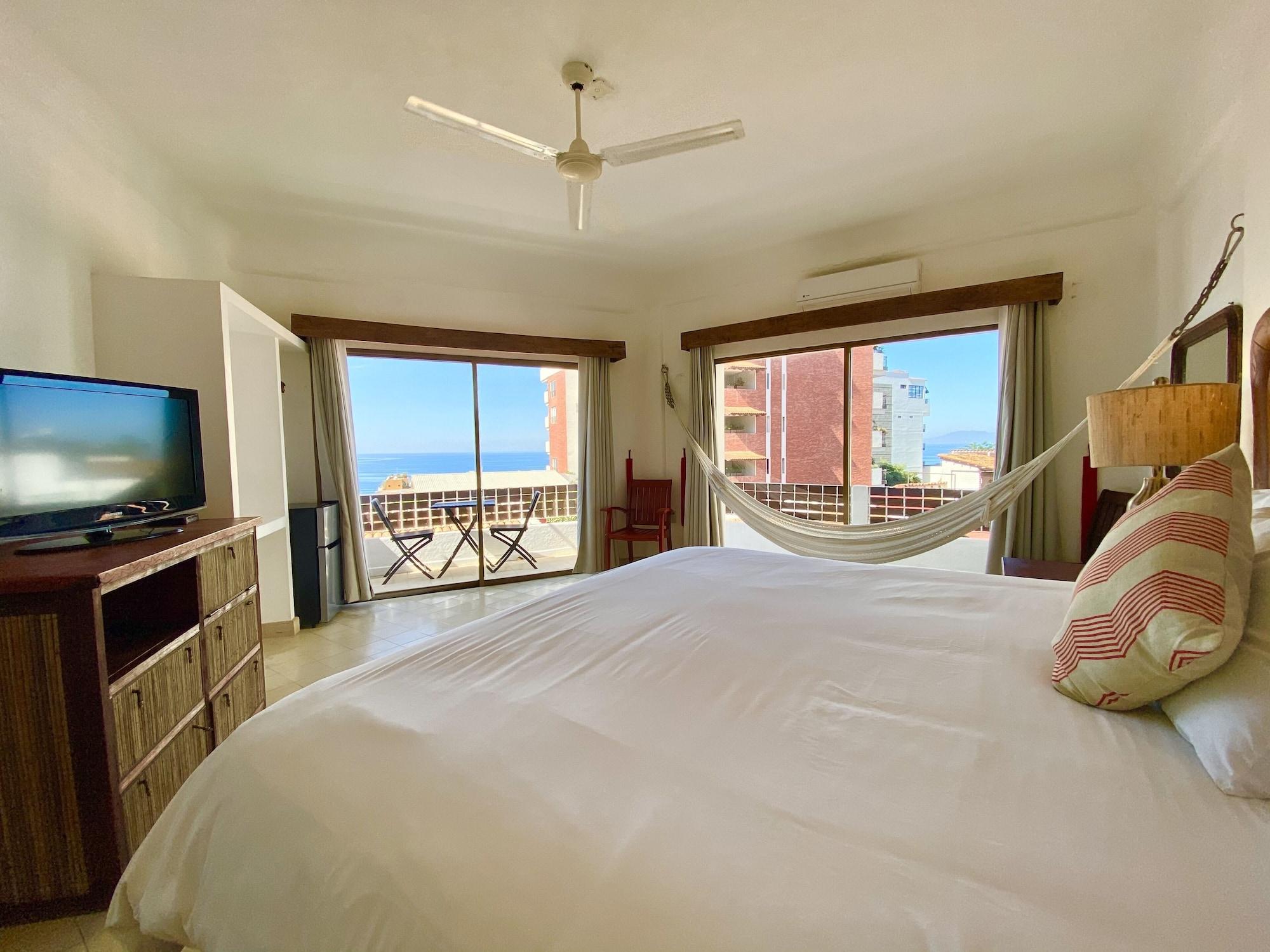 Premium Partial Ocean View Balcony 1 King Bed