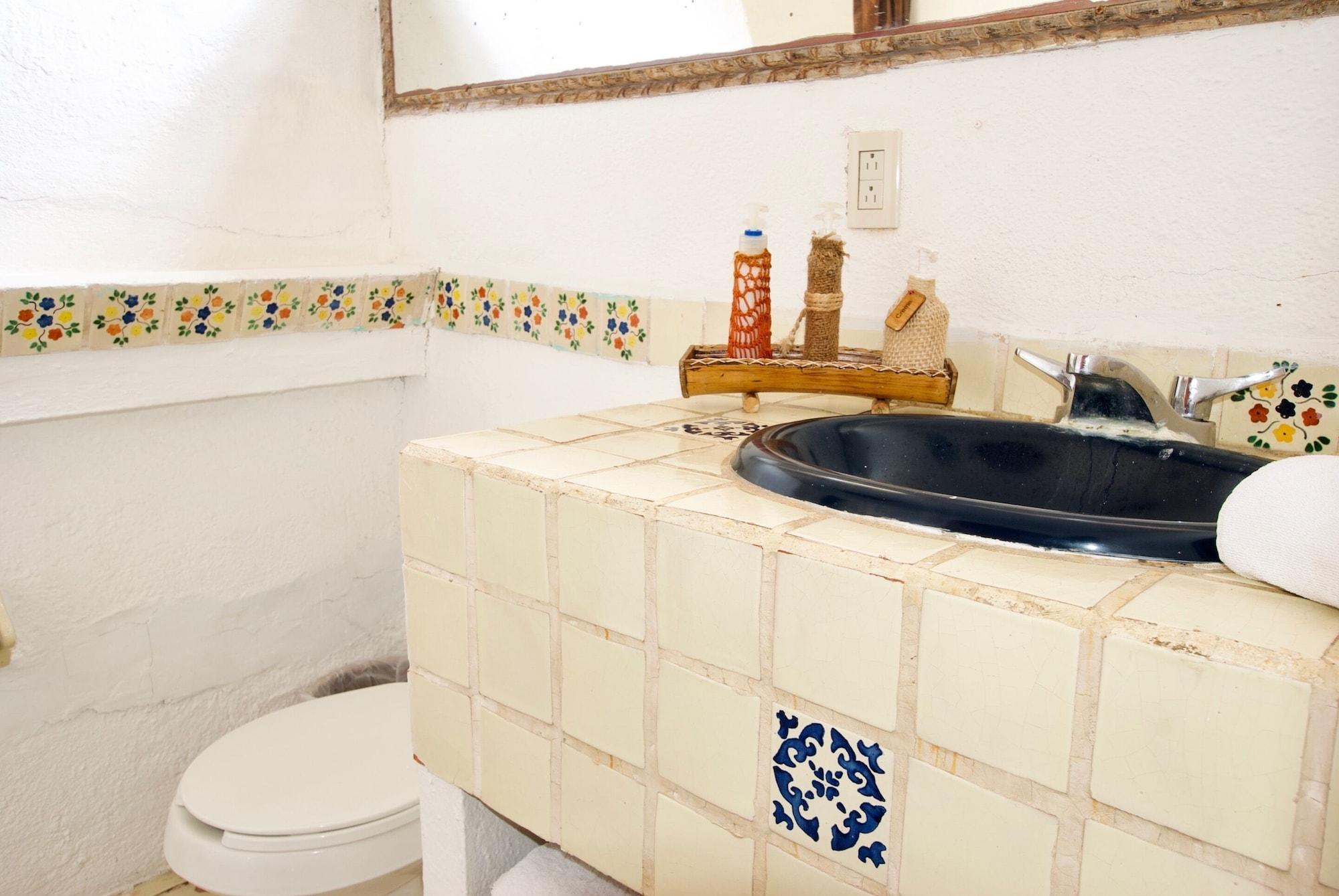 Habitación, vista parcial al mar