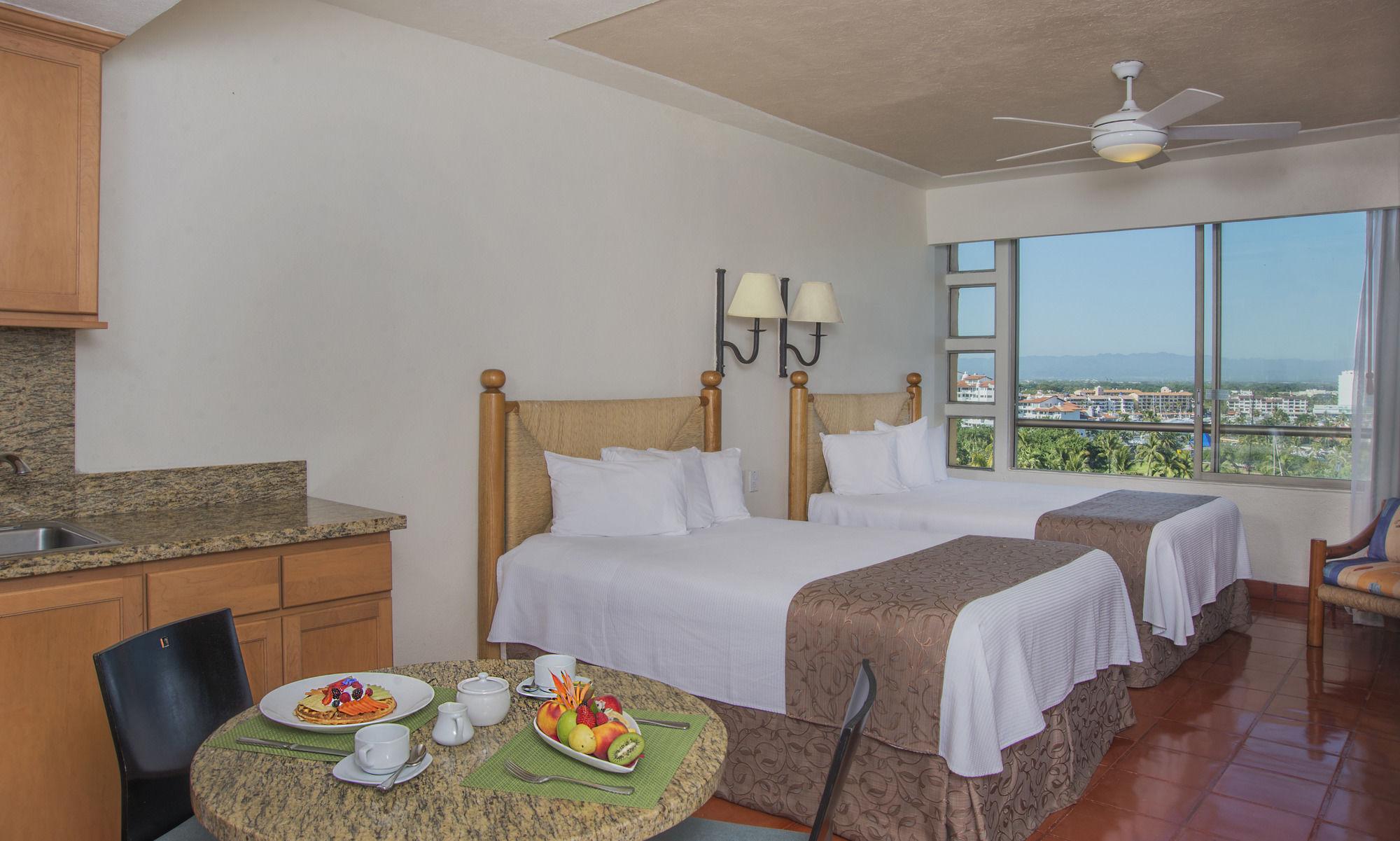 Suite estudio, 2 camas dobles, kitchenette, vista al jardín