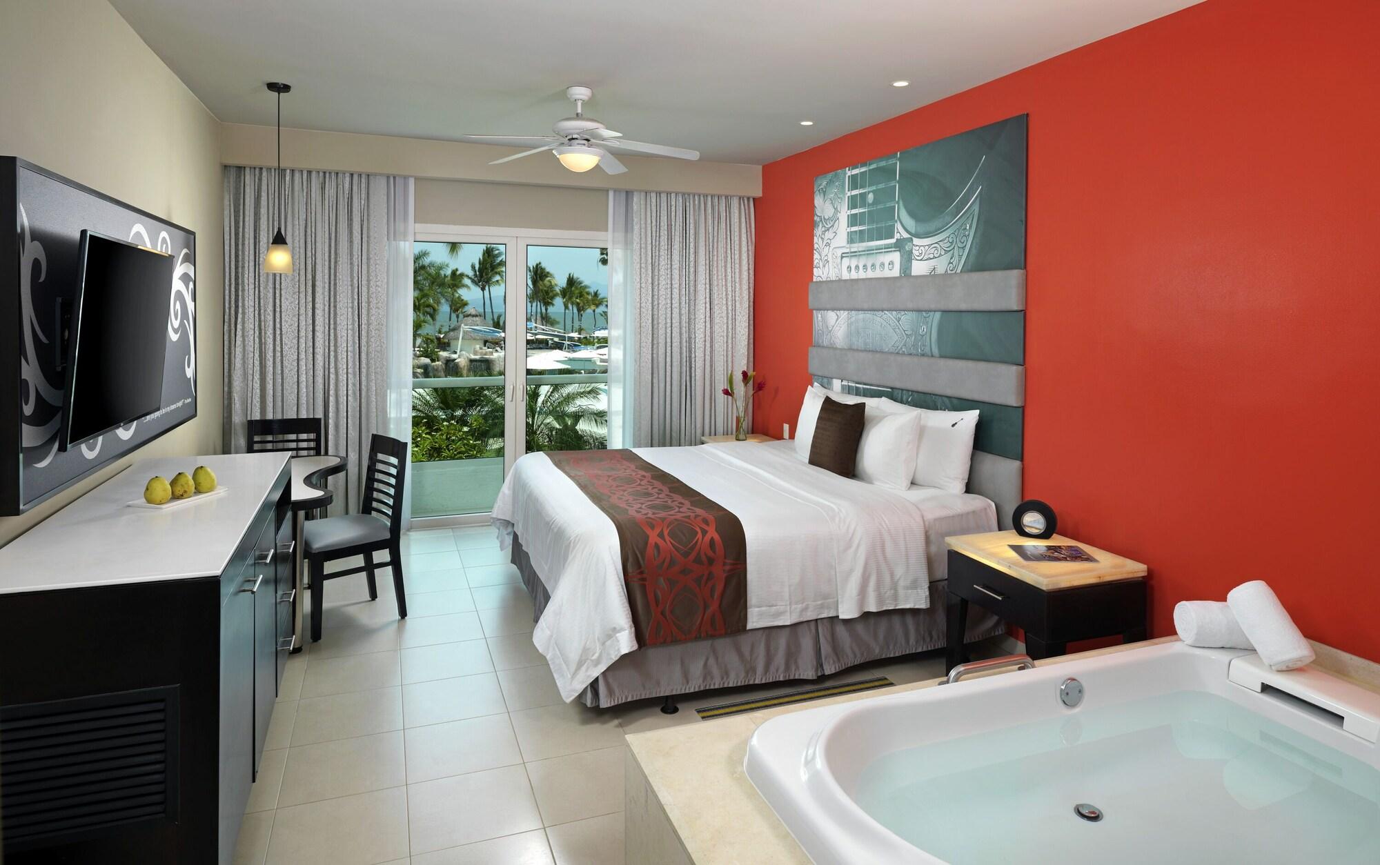 Deluxe Vista Parcial Al Mar Cama King