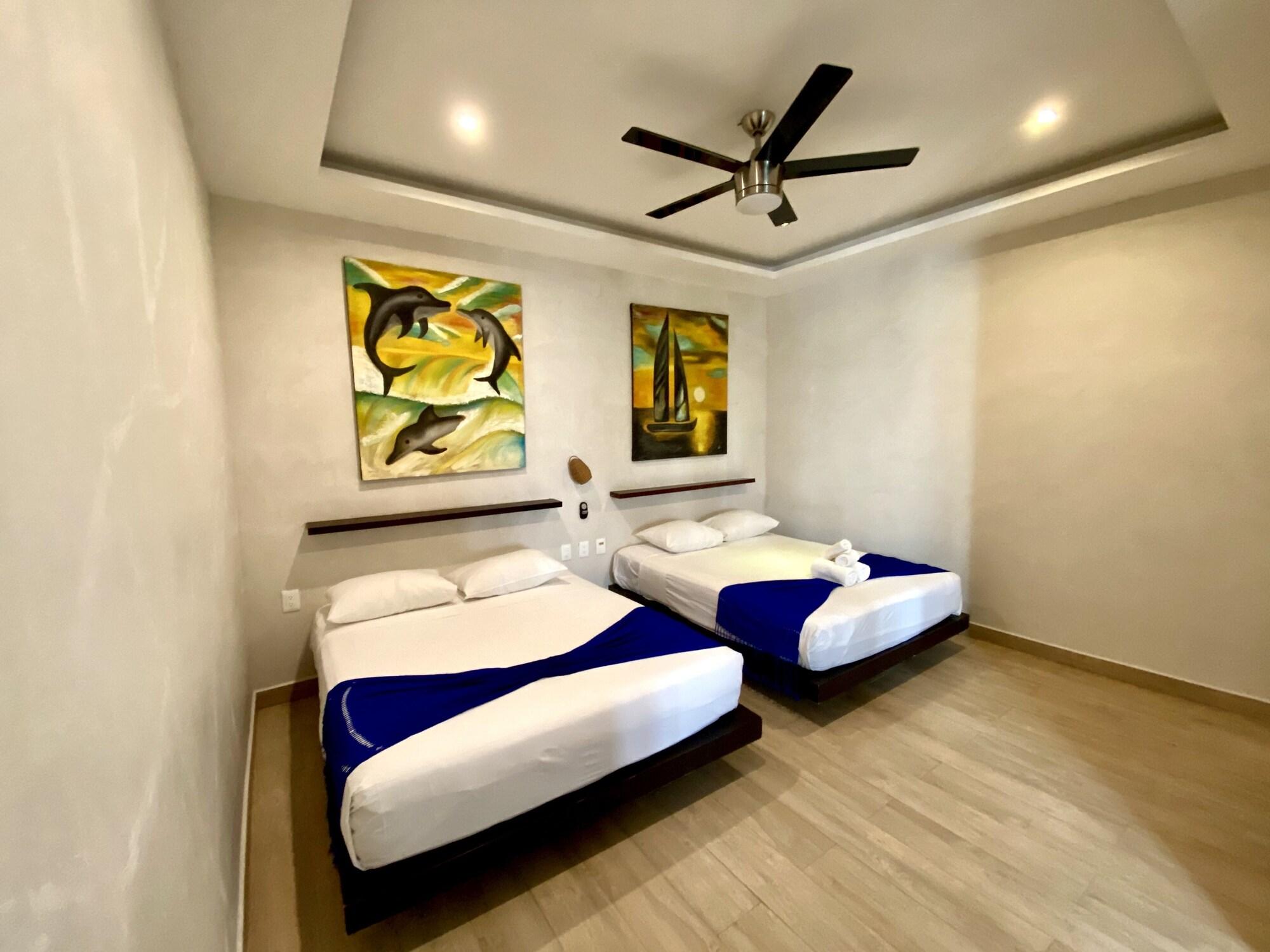 Suite junior, Varias camas, vista a la piscina