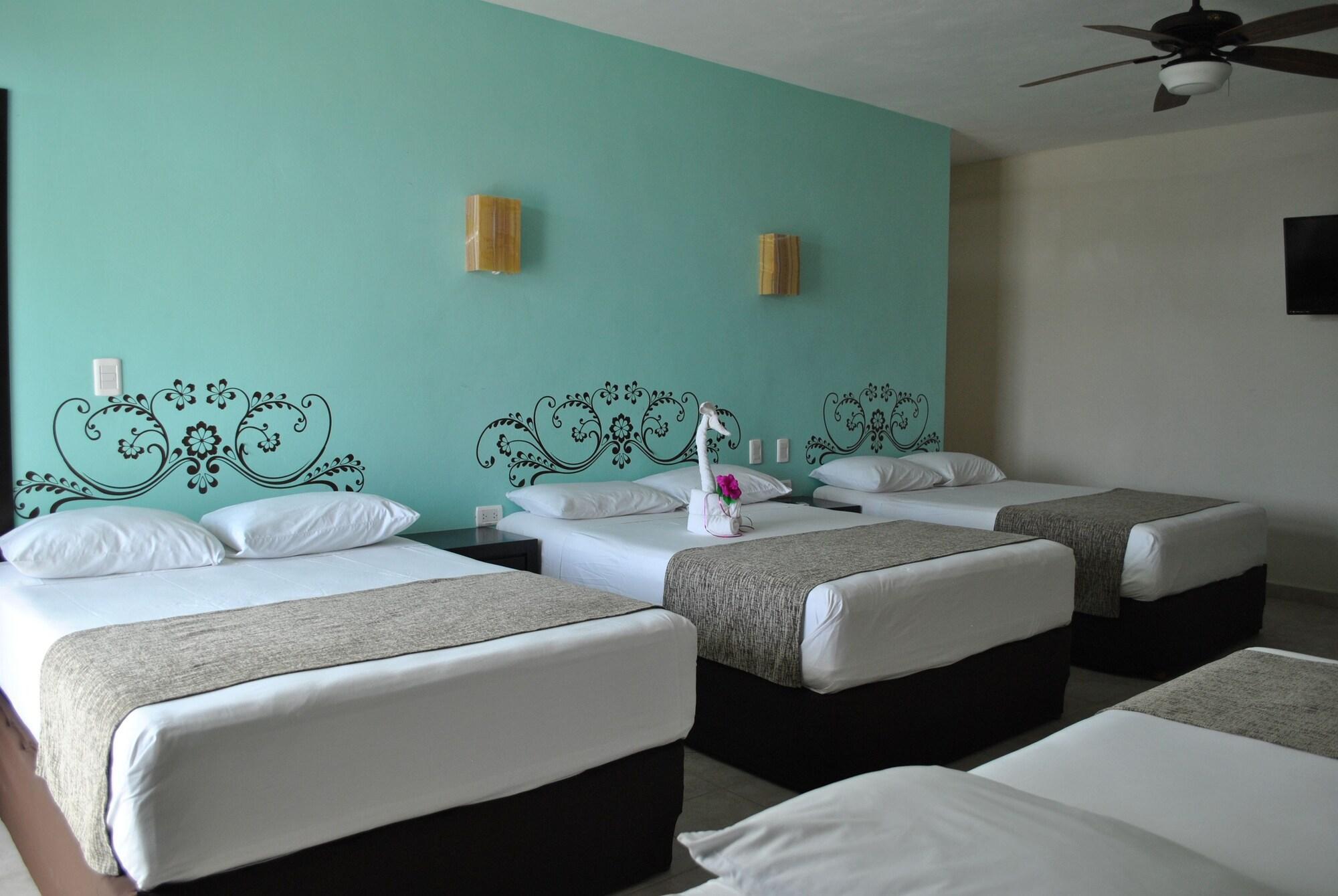 CUADRUPLE DELUXE ROOM