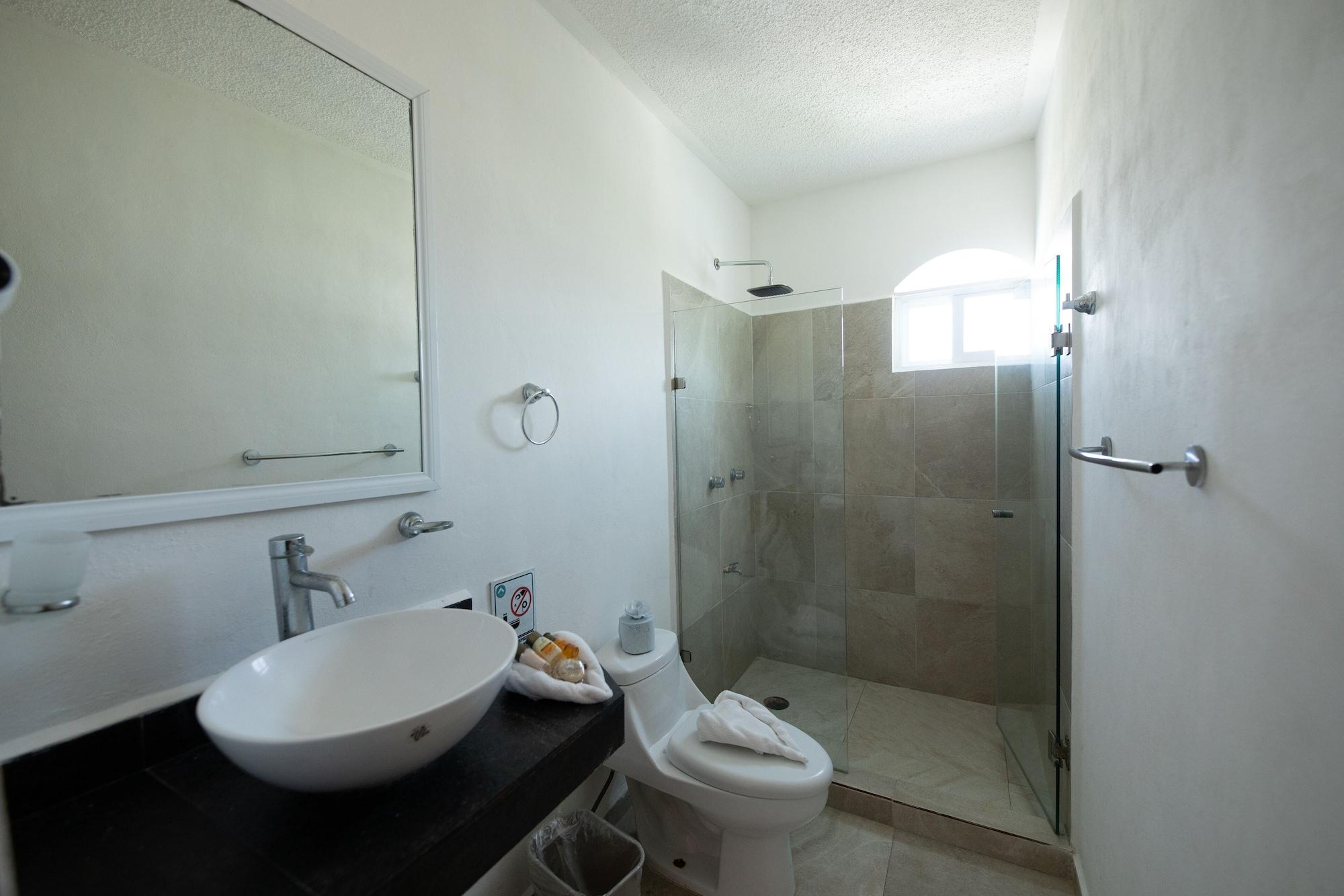 Habitación Deluxe, 2 camas dobles, vista parcial al océano