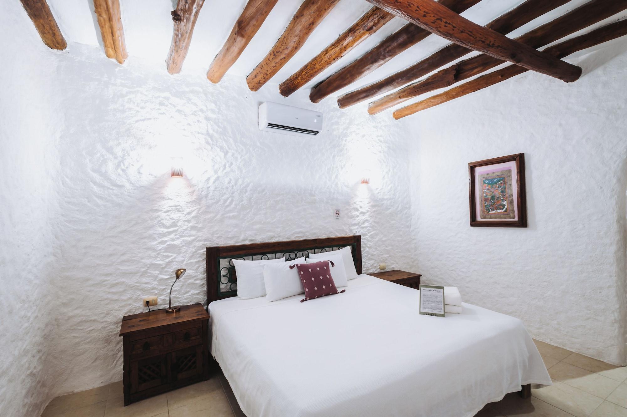 Habitación superior, 1 cama King size, vista al jardín