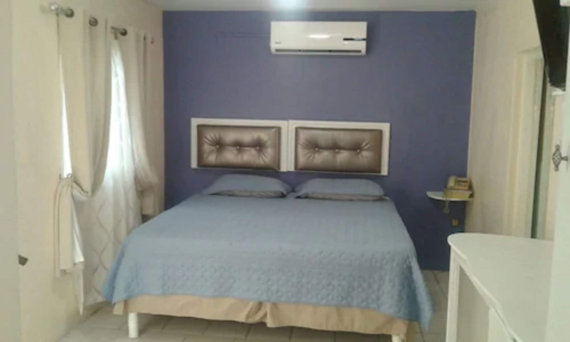 Habitación Sunset Inn Hotel