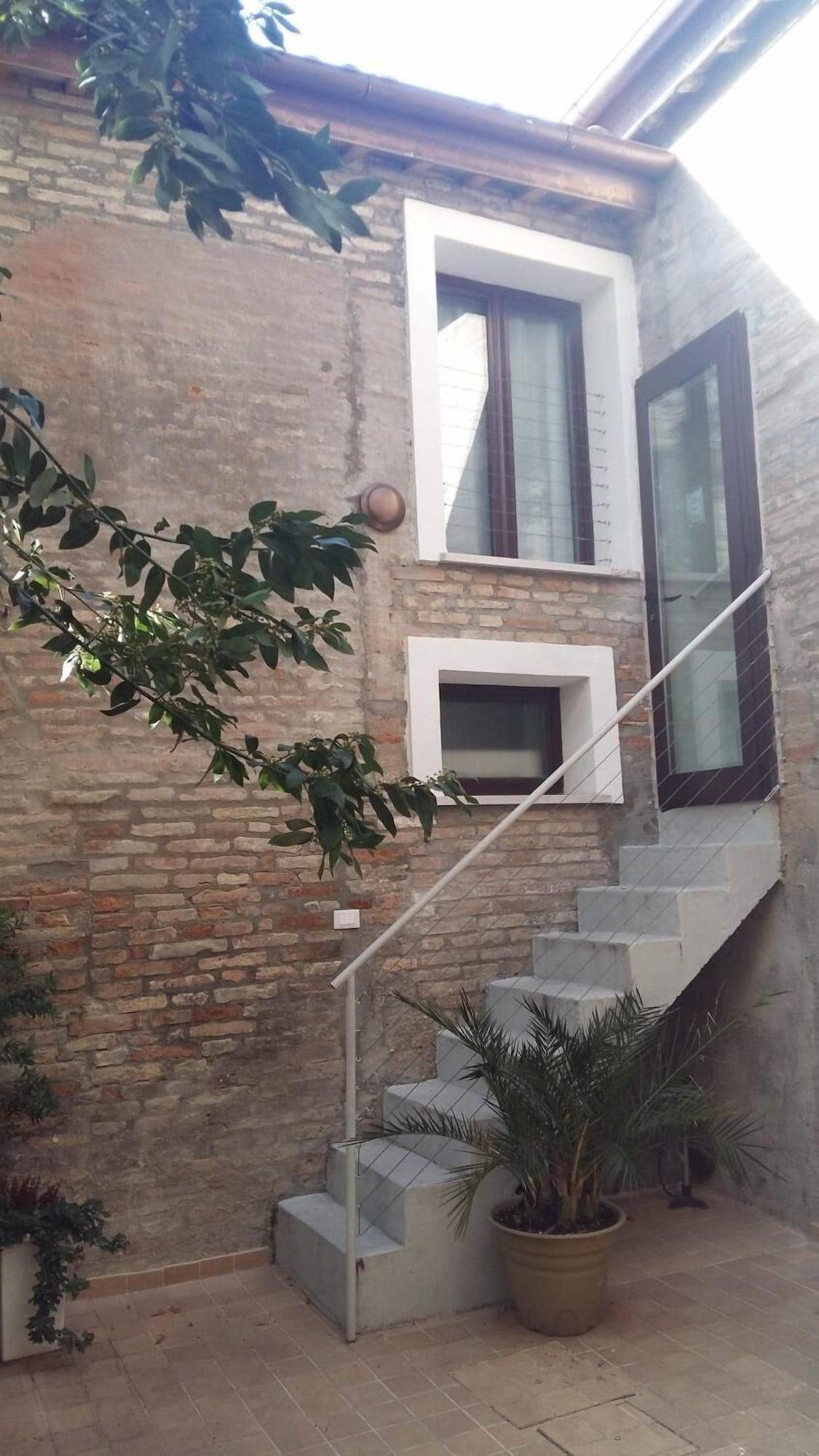 Vista Exterior Toscanini Rooms