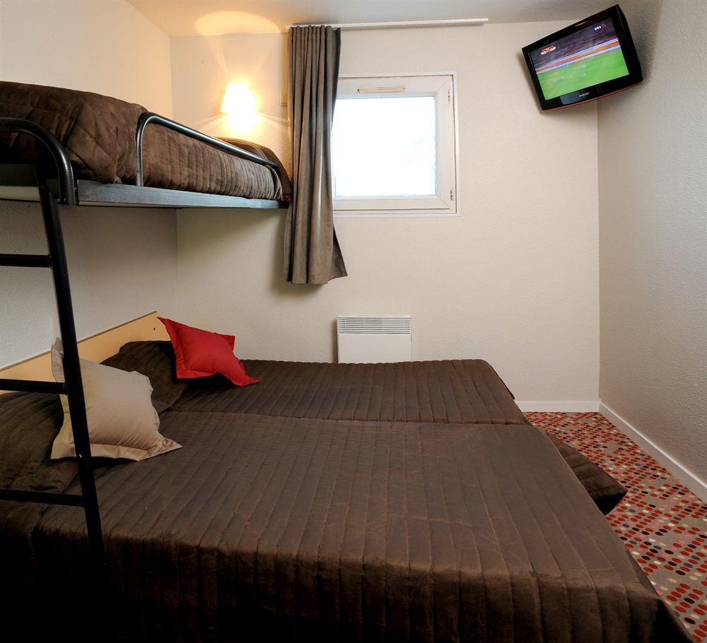 Habitación Welcomotel Les Mureaux