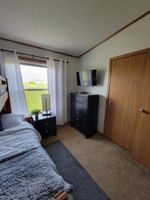 Alquiler Vacacional - Three bedroom home on a large lot with a lake view