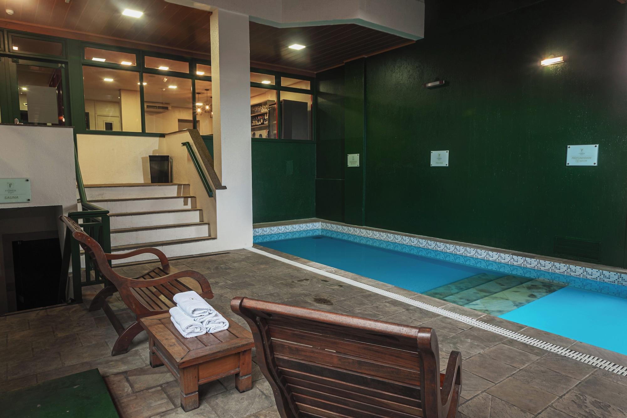 Vista Piscina Hotel Fioreze Origem