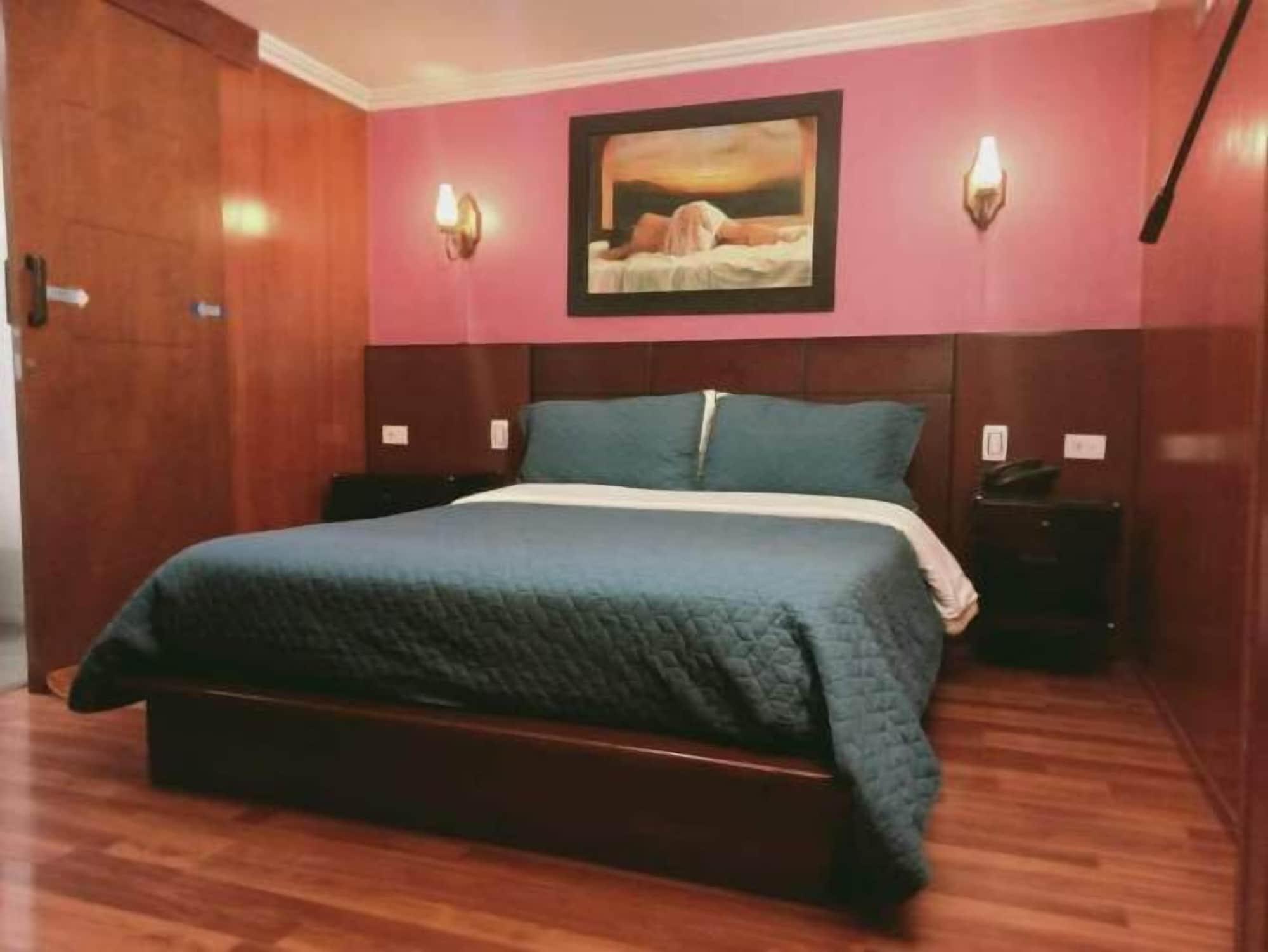 Comodidades do quarto Hotel Apartasuite Normandia
