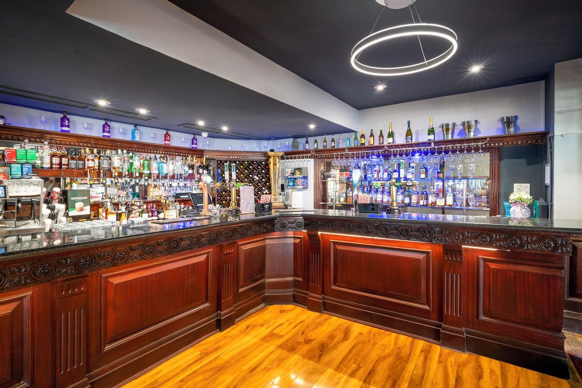 Bar/Salón The International Hotel