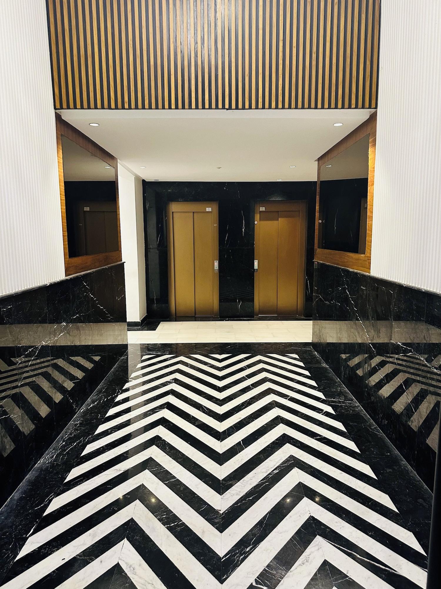 Vista Lobby Stay'Inn - Palmier Luxury Living