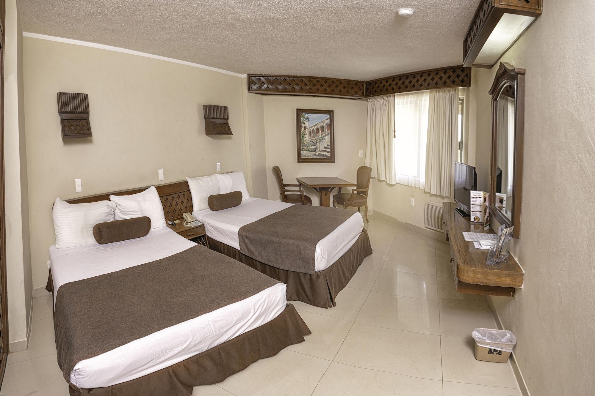 Habitación Hotel Plaza Kokai Cancún