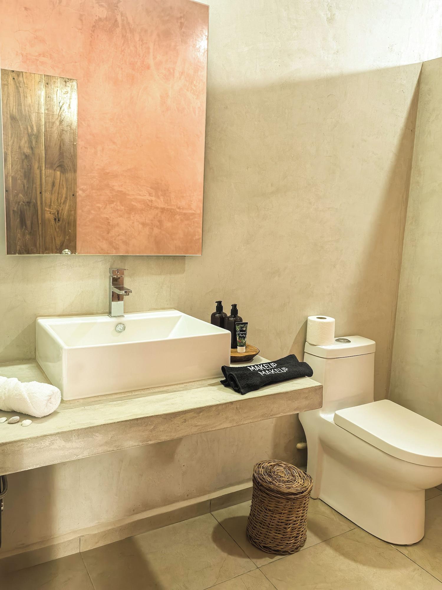 Equipamiento de Habitación LaFamilia Casa and Suites