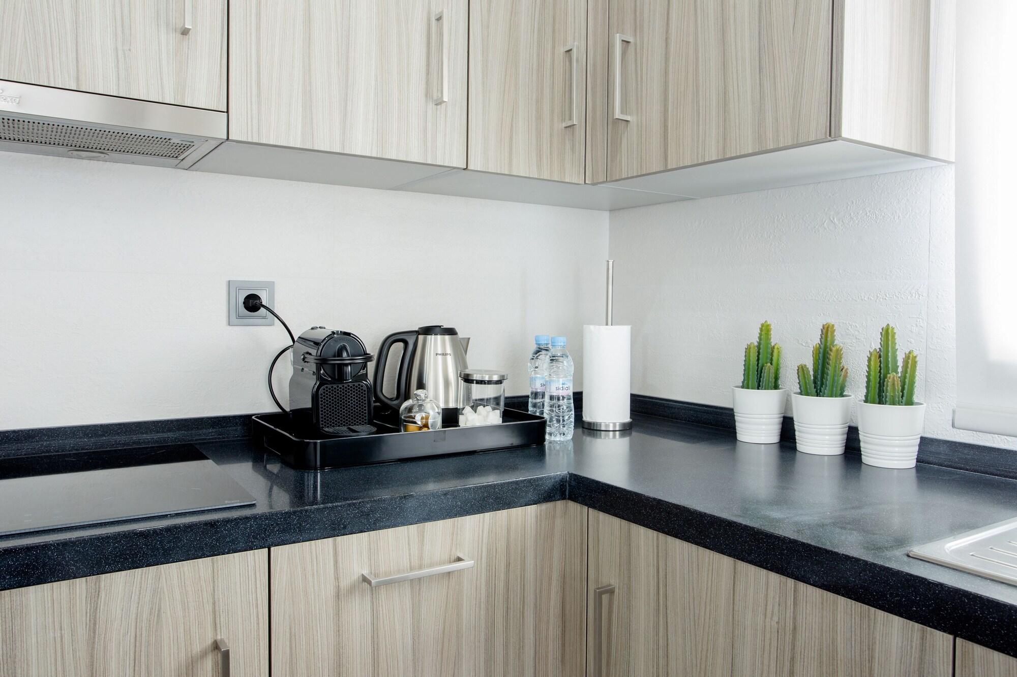 Equipamiento de Habitación Makass Appart Hotel