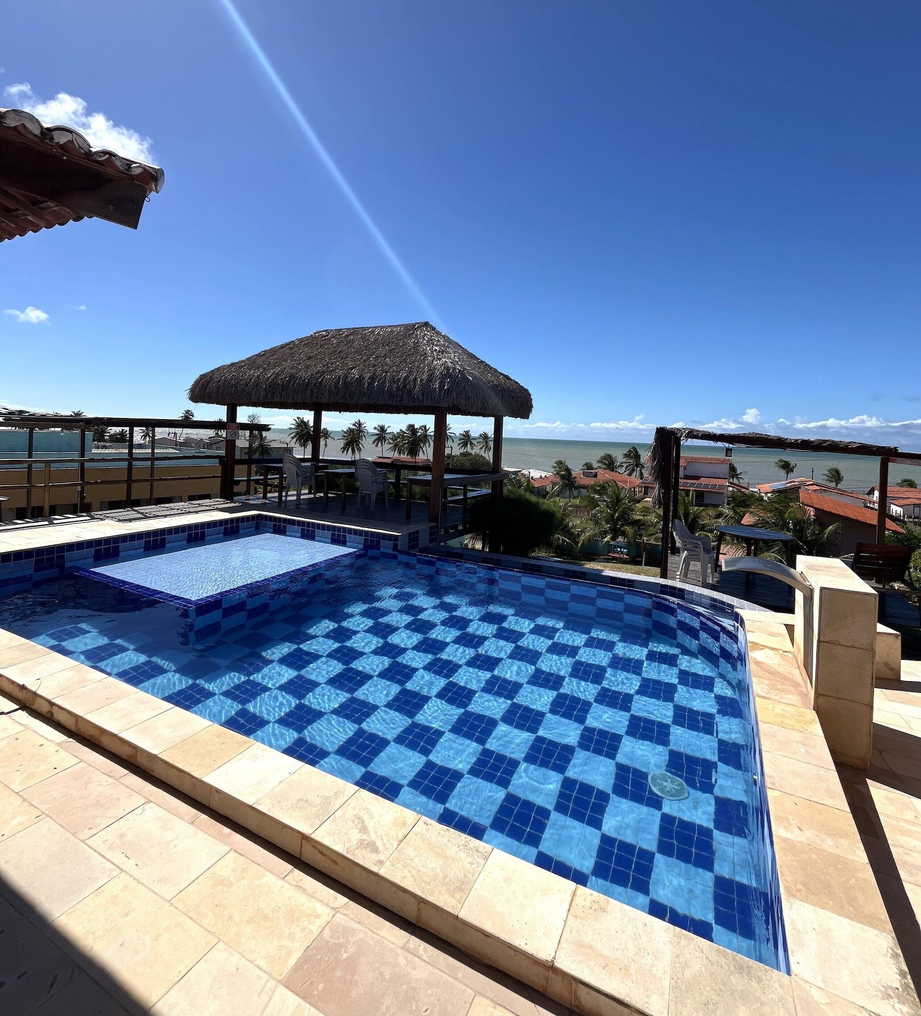 Vista da piscina Pousada Bugaendrus Paradise