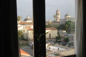 Alquiler Vacacional - Top floor small loft overlooking the old town near to the beach