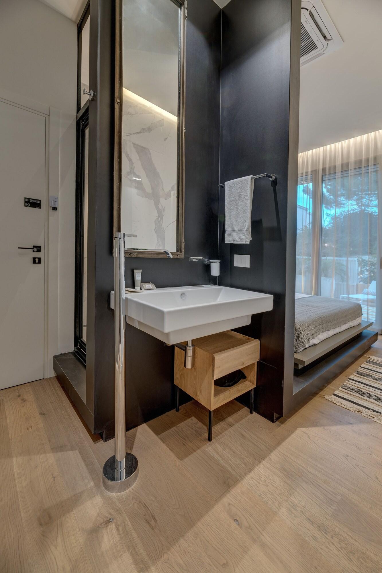 Habitación Le Palmette Suites