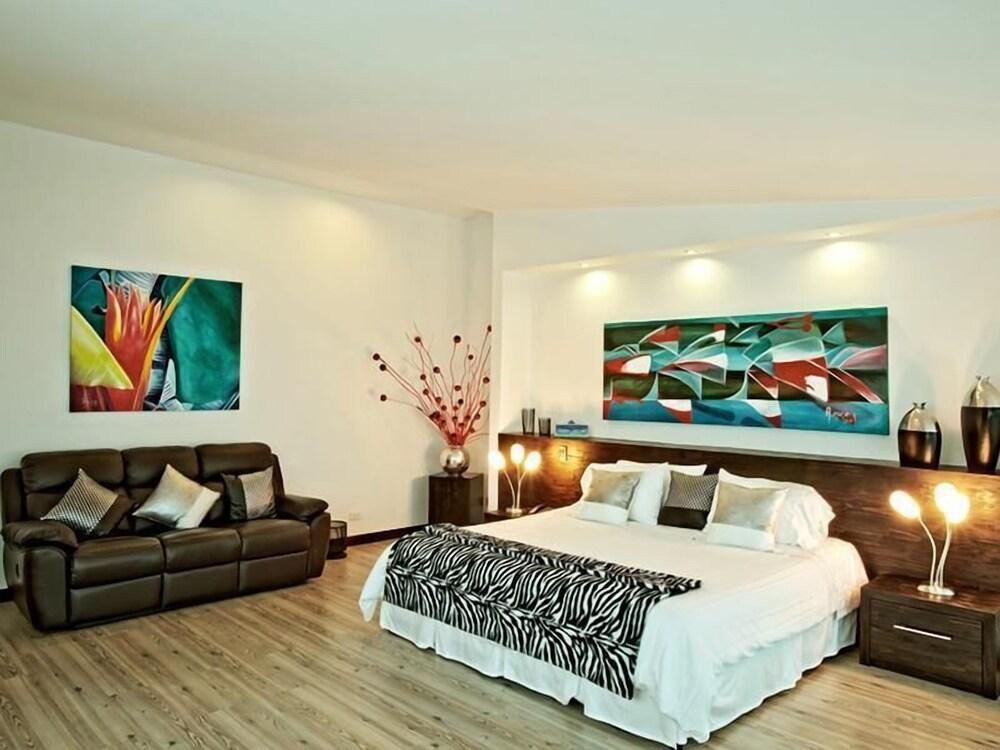 Habitación Habitat Suites Hotel
