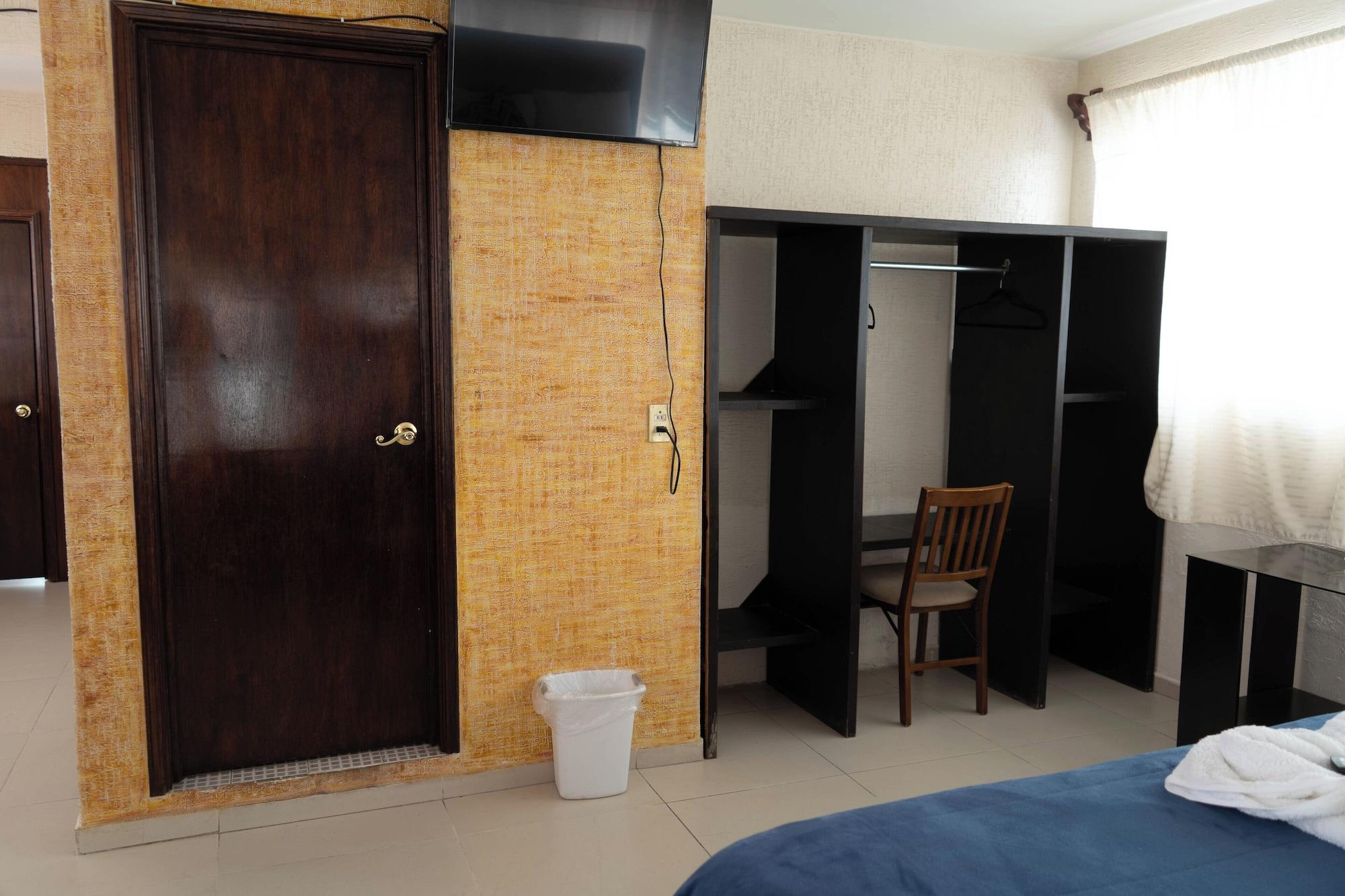 Equipamiento de Habitación Komod Business Hotel