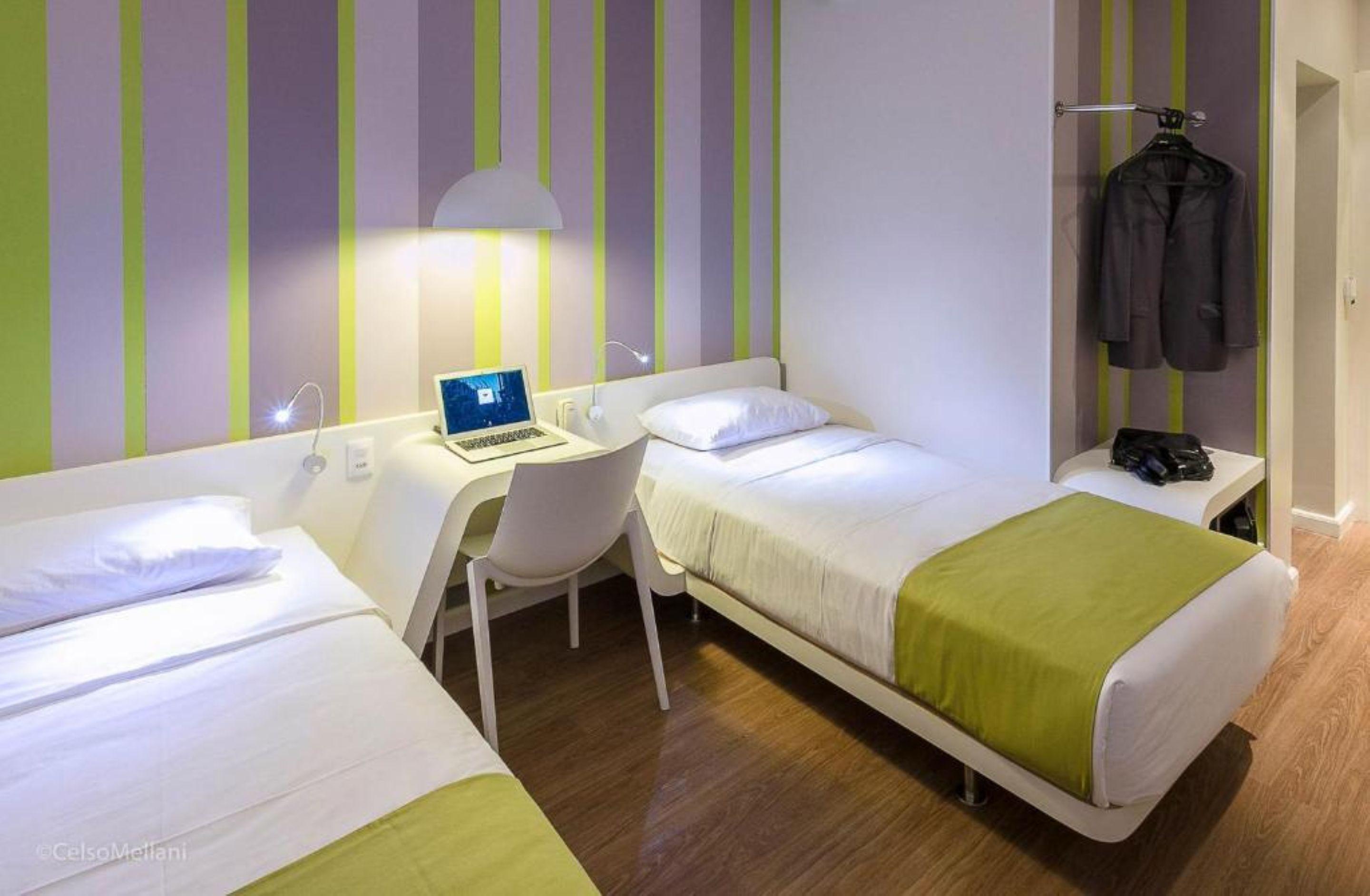Habitación DMax Hotel