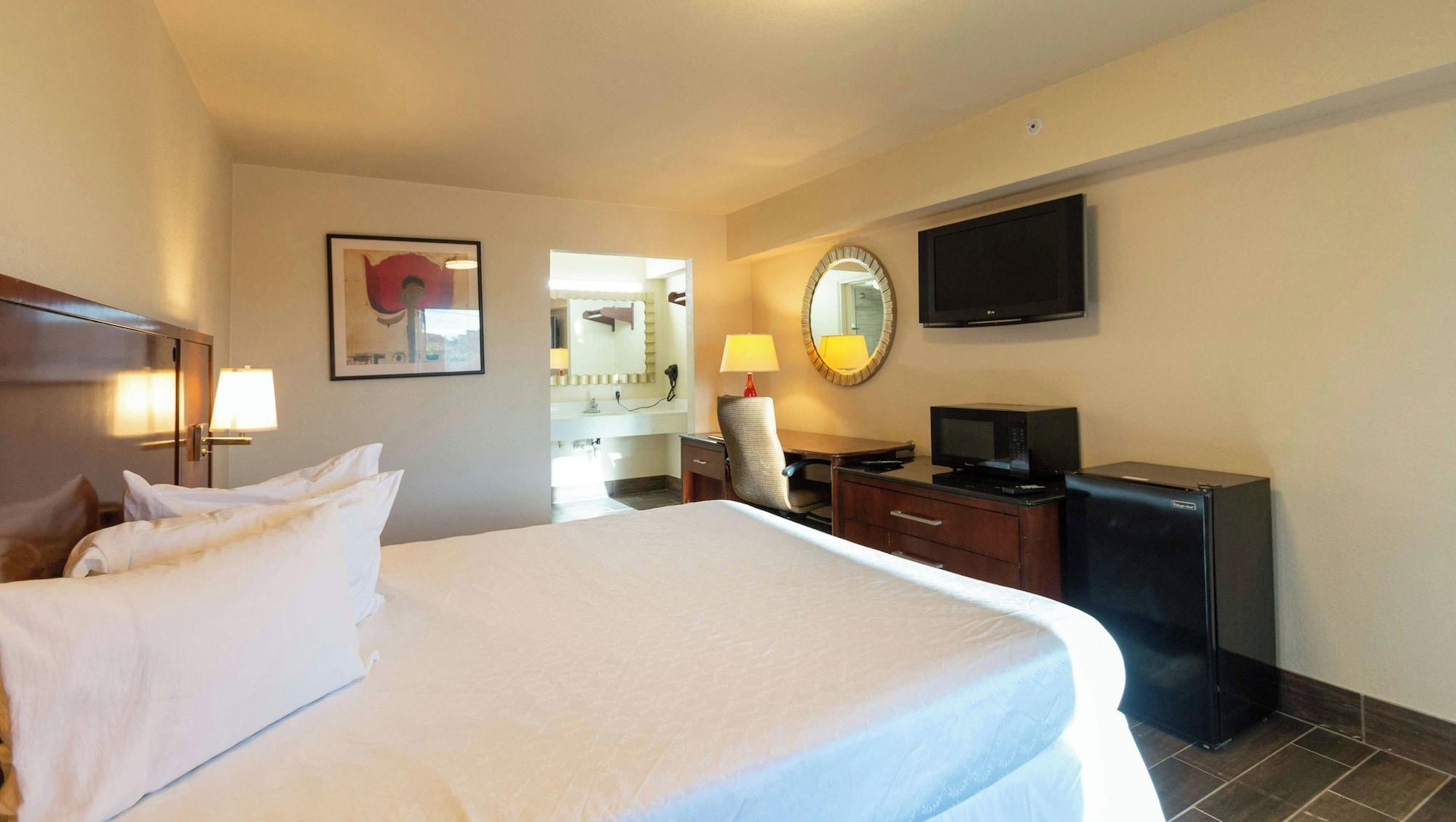 Habitación Magnuson Extended Stay and Suites Airport Hotel