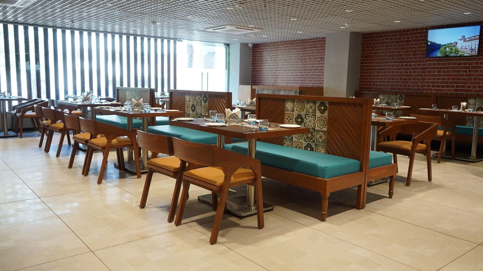 Restaurant Purple Beds by VITS Dwarkesh, Surat