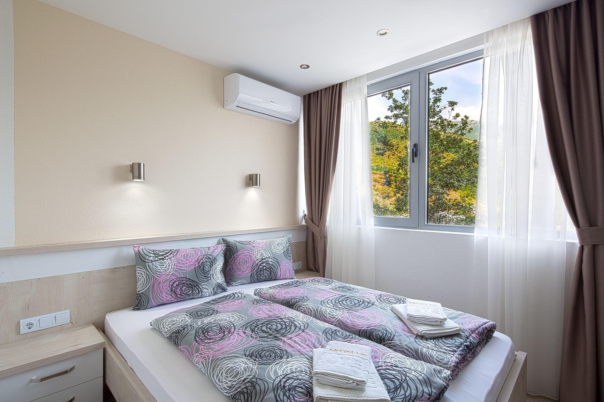 Habitación Montelux Apartments