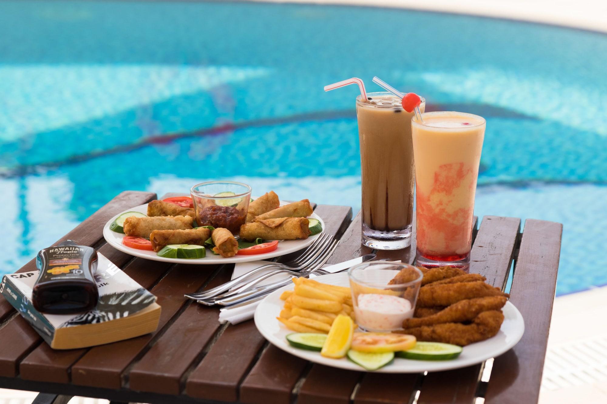 Restaurant Savoy Central Hotel Apartments