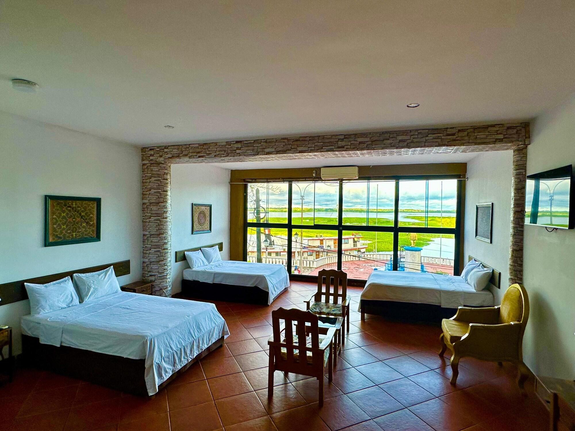 Habitación La Posada Del Cauchero Hotel & Suites