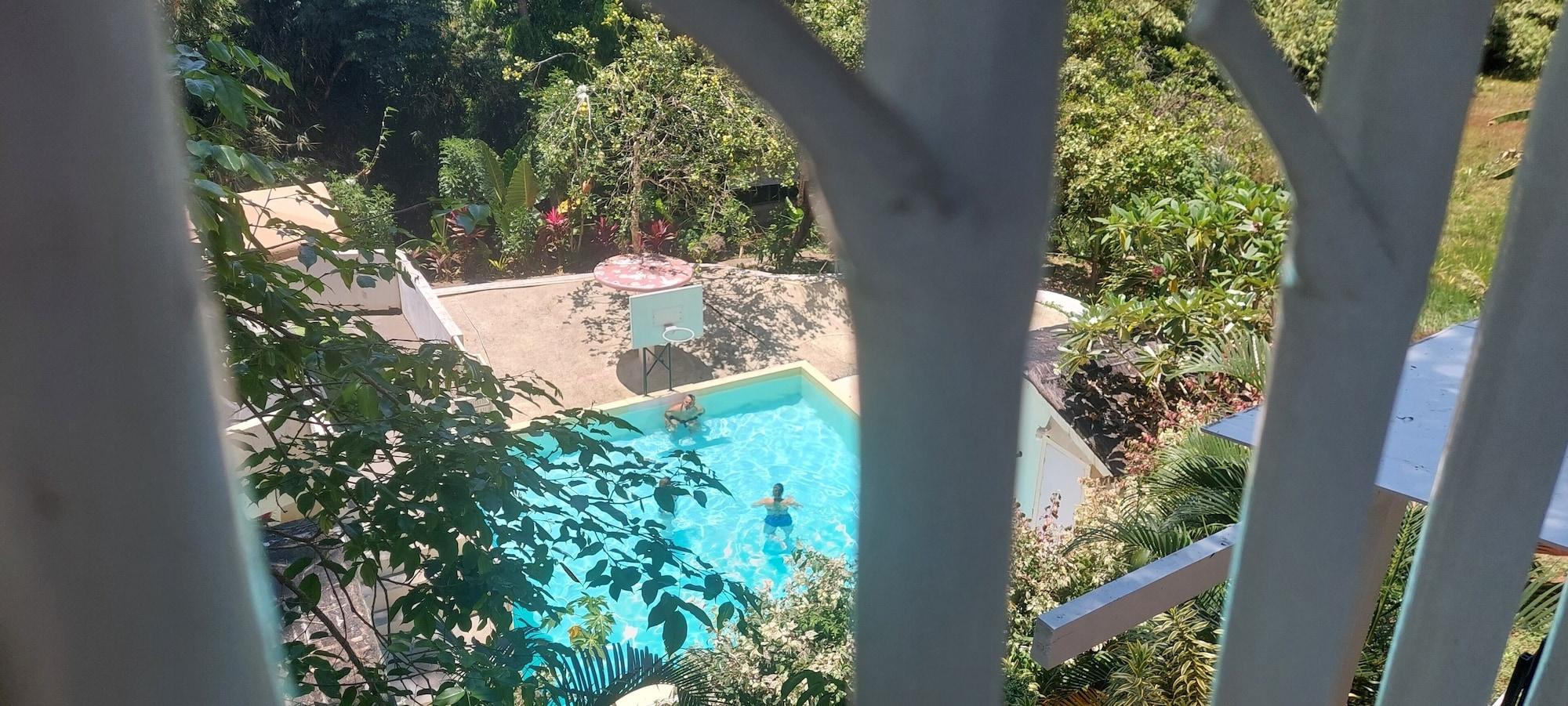 Vista Exterior A touch of pink secret garden resort