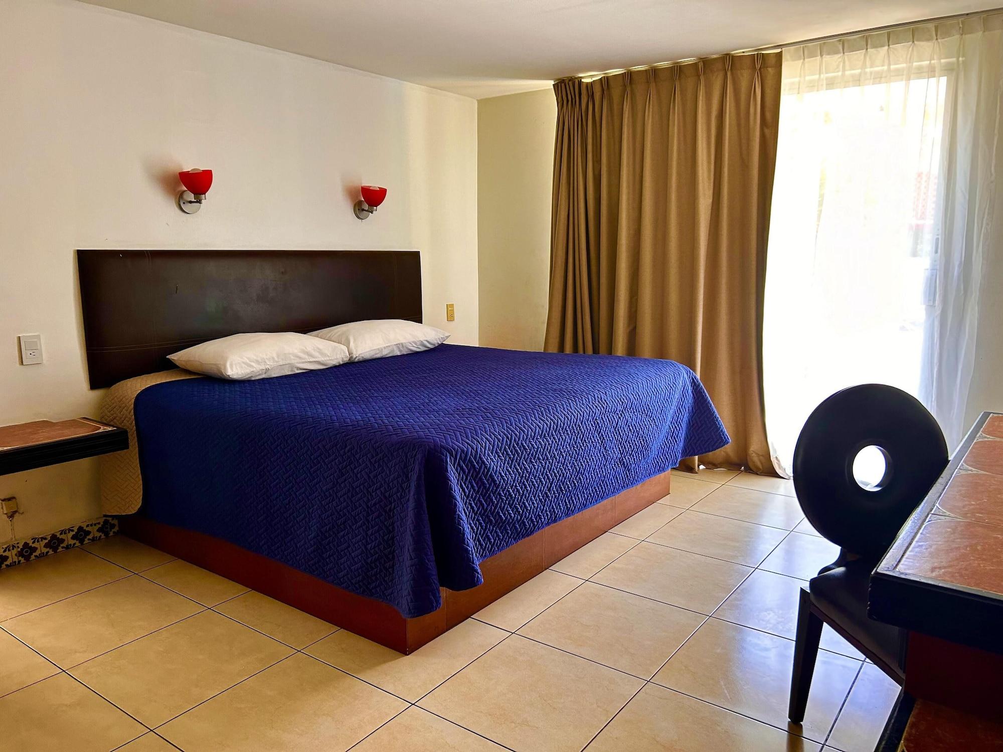 Habitación VF Villa Florencia Hotel