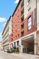 Alojamiento - Queen's Court Hotel & Residence