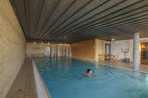 Vista Piscina Waldhotel Sonnenberg