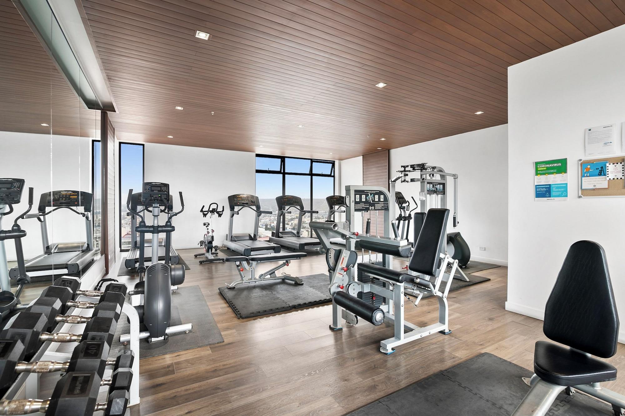 Gimnasio Distrito Revolution Suites