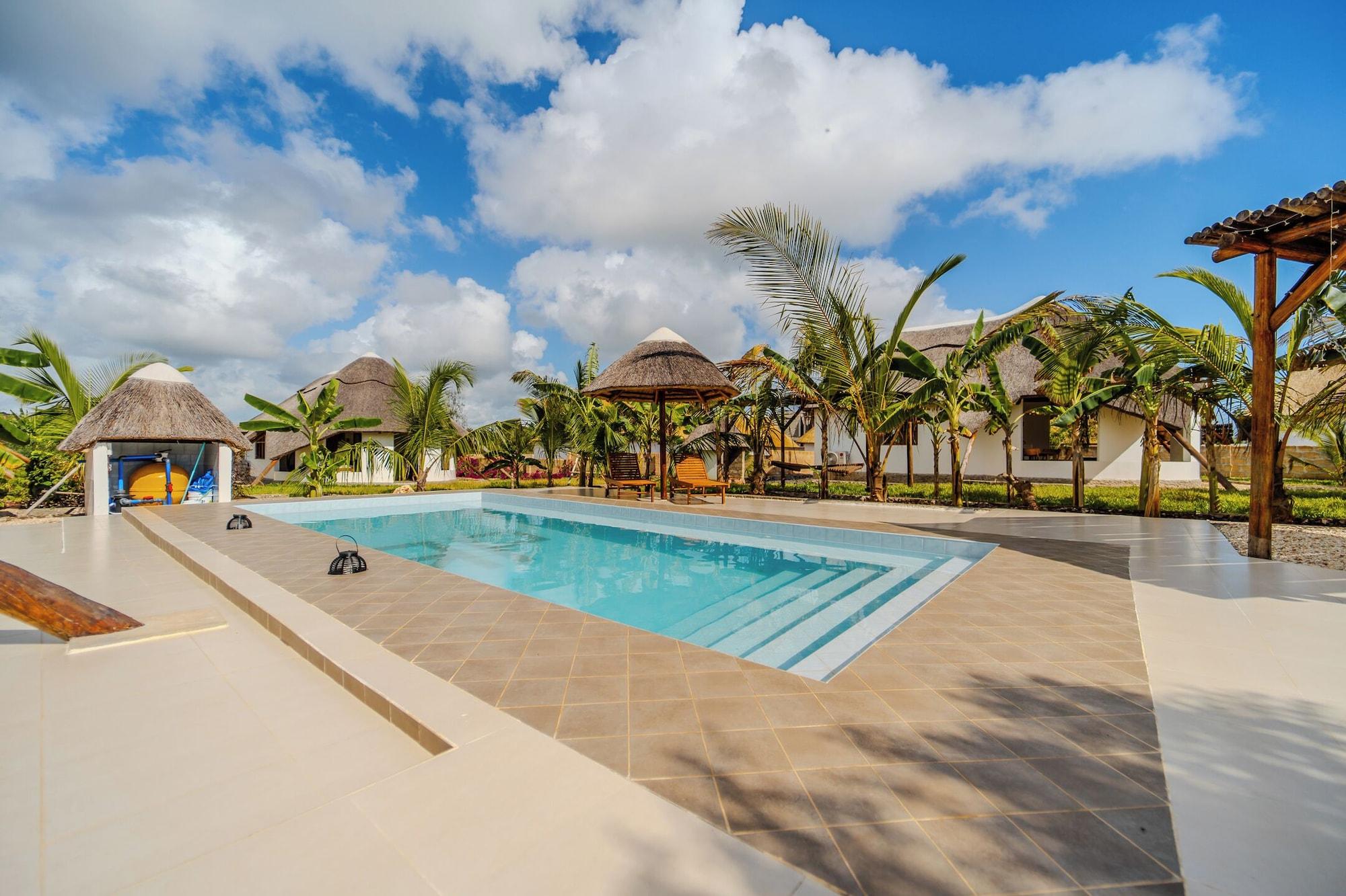 Vista Piscina Zaria Garden Bungalow