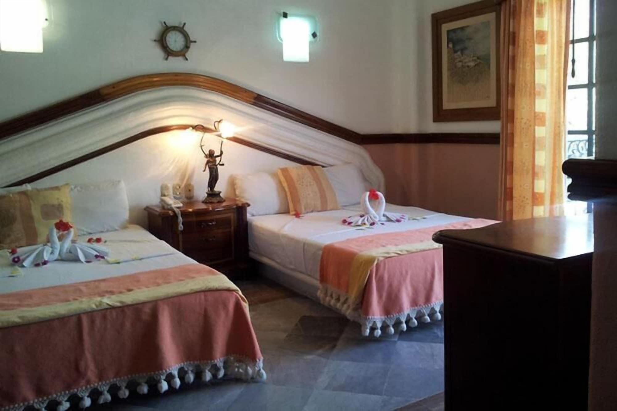 Habitación Canadian Resorts Huatulco